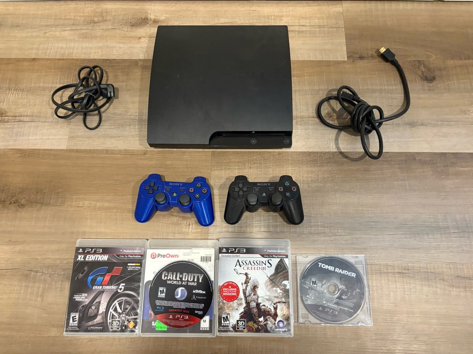 Sony PlayStation PS3 Slim Console CECH-3001A 150GB 2 Controllers,Cords & 4 Games