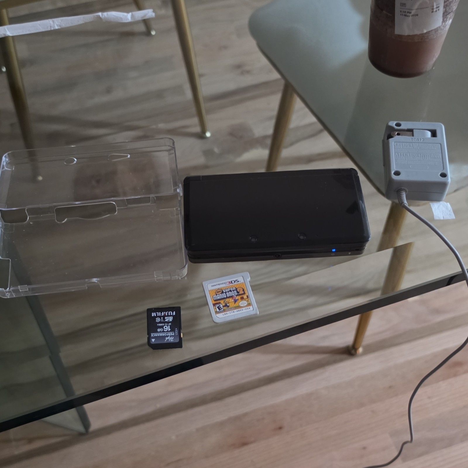 Nintendo 3DS Black 3D Capable Console w/ Charger, 16GB SD & Mario Bros 2