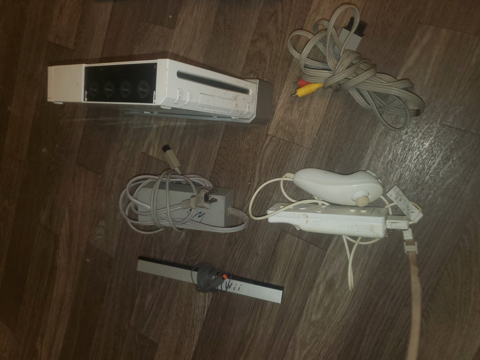 wii console bundle (1 remote, 1 nunchuk, 1 motion bar, 1 dance pad)