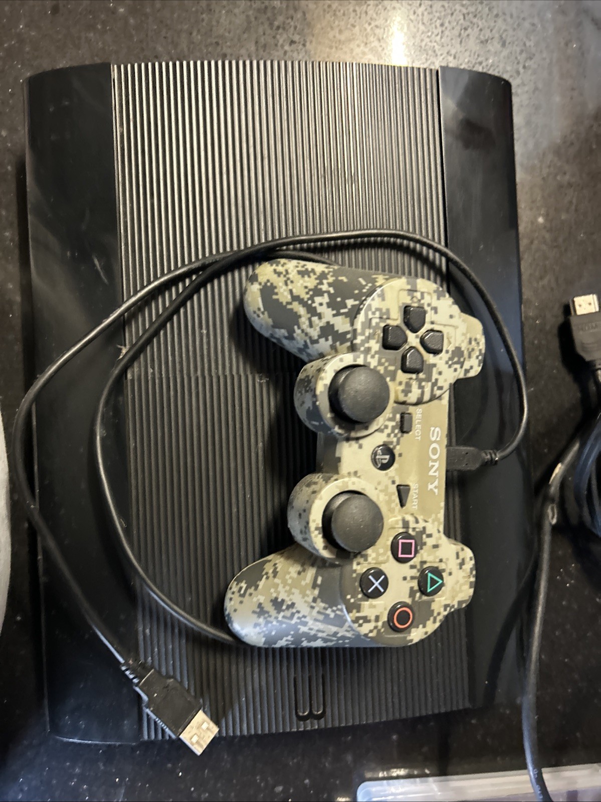 Sony PlayStation 3 Super Slim Black Console 500 GB with 4 Games and 1 Controller
