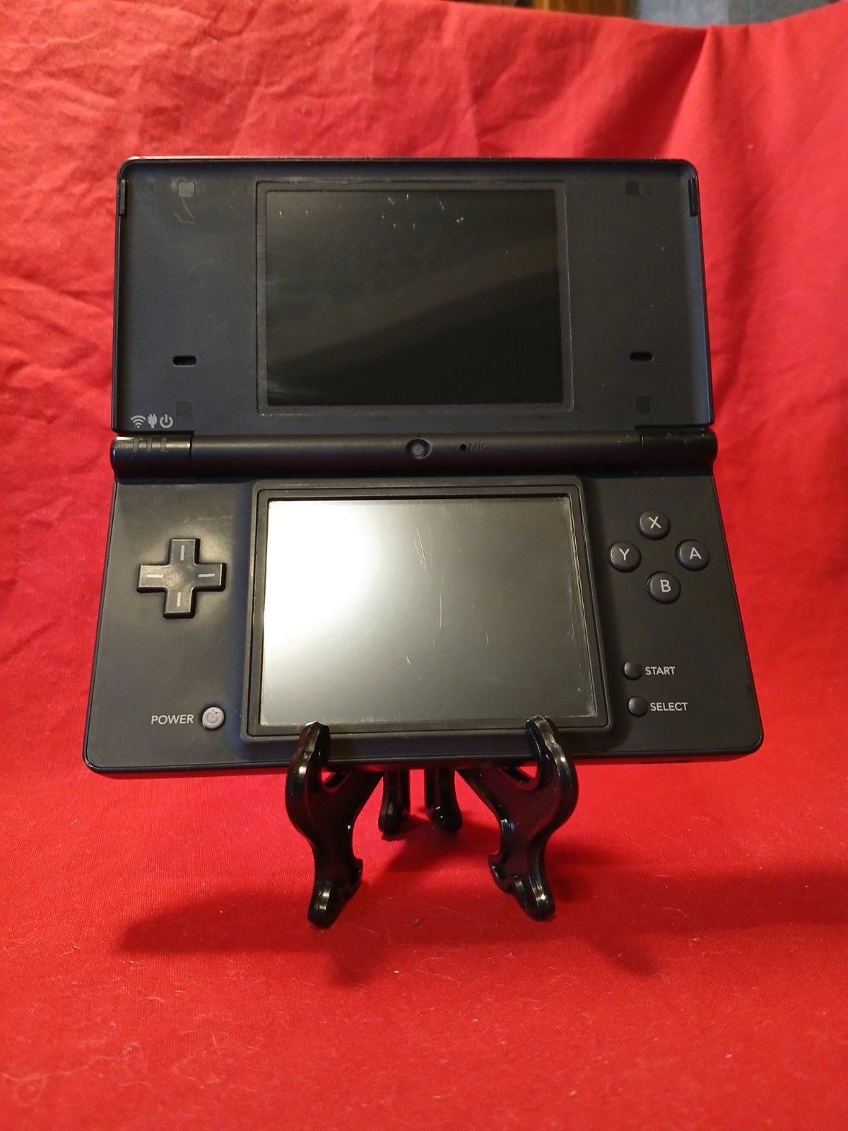 Nintendo DSi Black Handheld System With SpongeBob’s Boating Bash Game