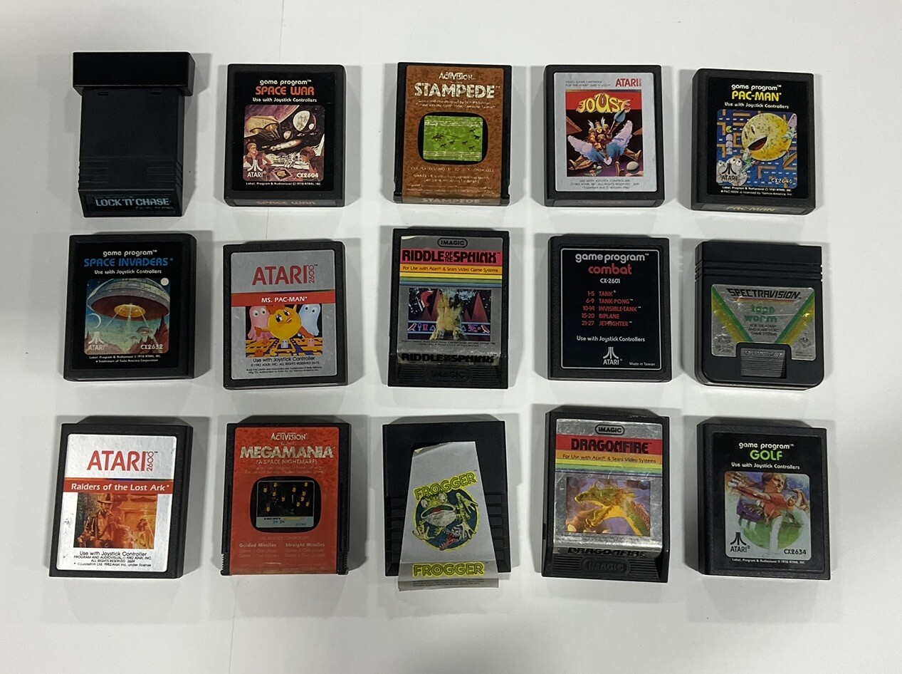 Atari 2600 With 32 Games 17 Of Them Have Manuals 3 Joysticks Video Game Holder