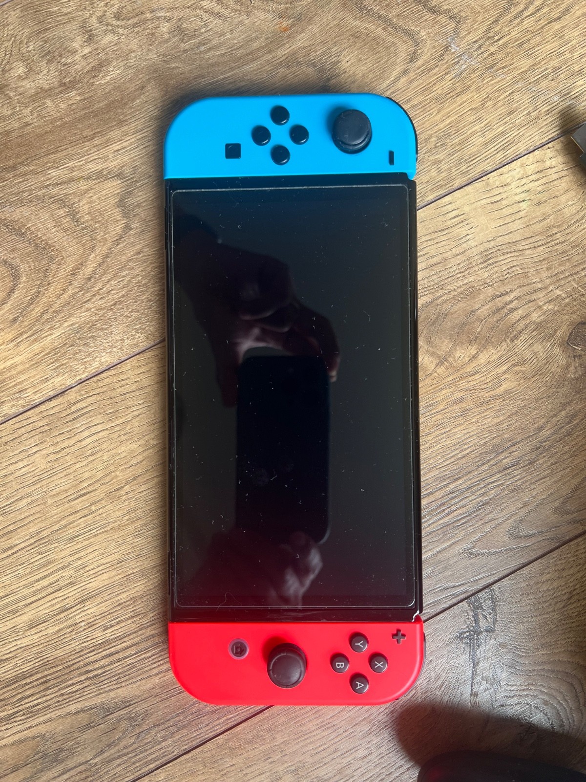 Nintendo Switch OLED Handheld Console – 64GB – Black/Neon Red/Neon