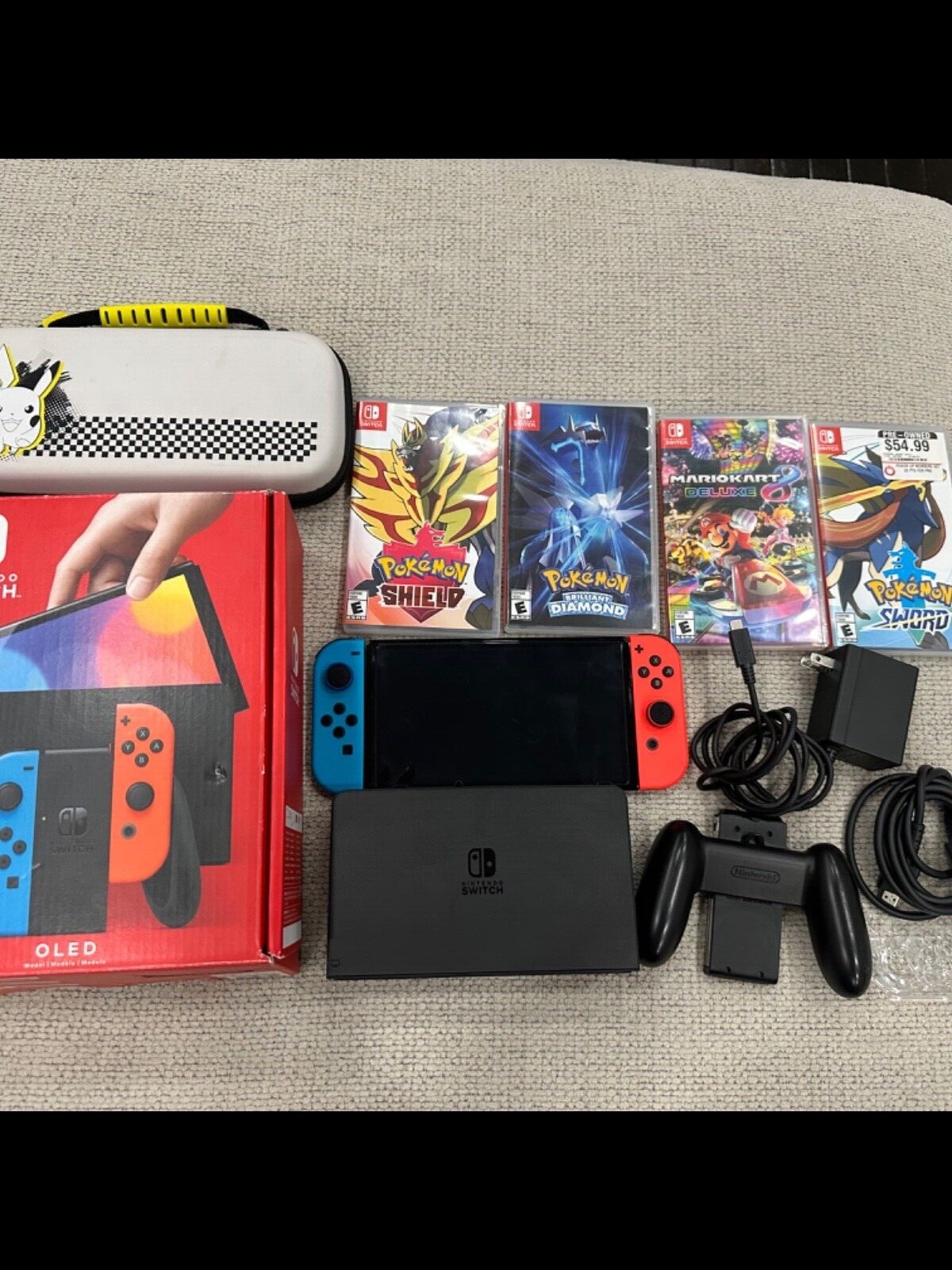 Barley used Nintendo Switch OLED Model-64GB Red/Blue with many games,accessories