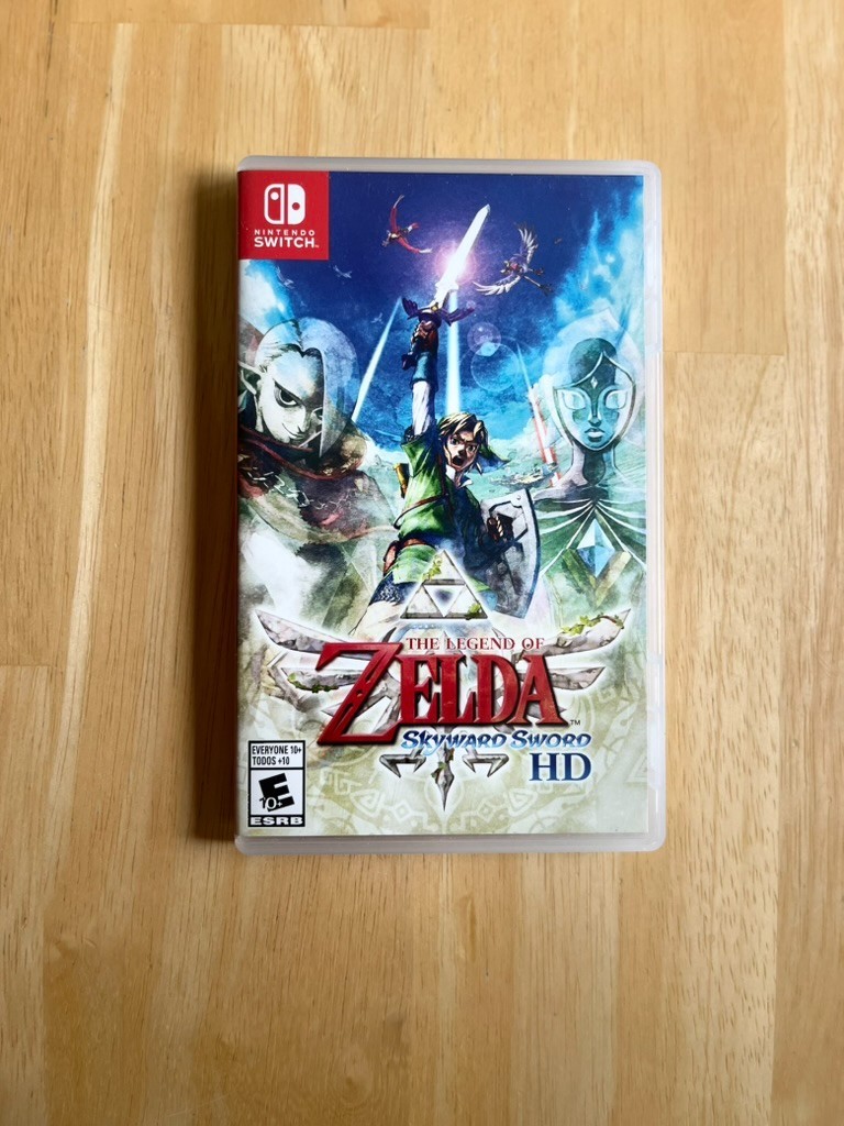 Nintendo Switch Console Bundle – Neon Red/Blue + White Joy‑Cons + Games + Case