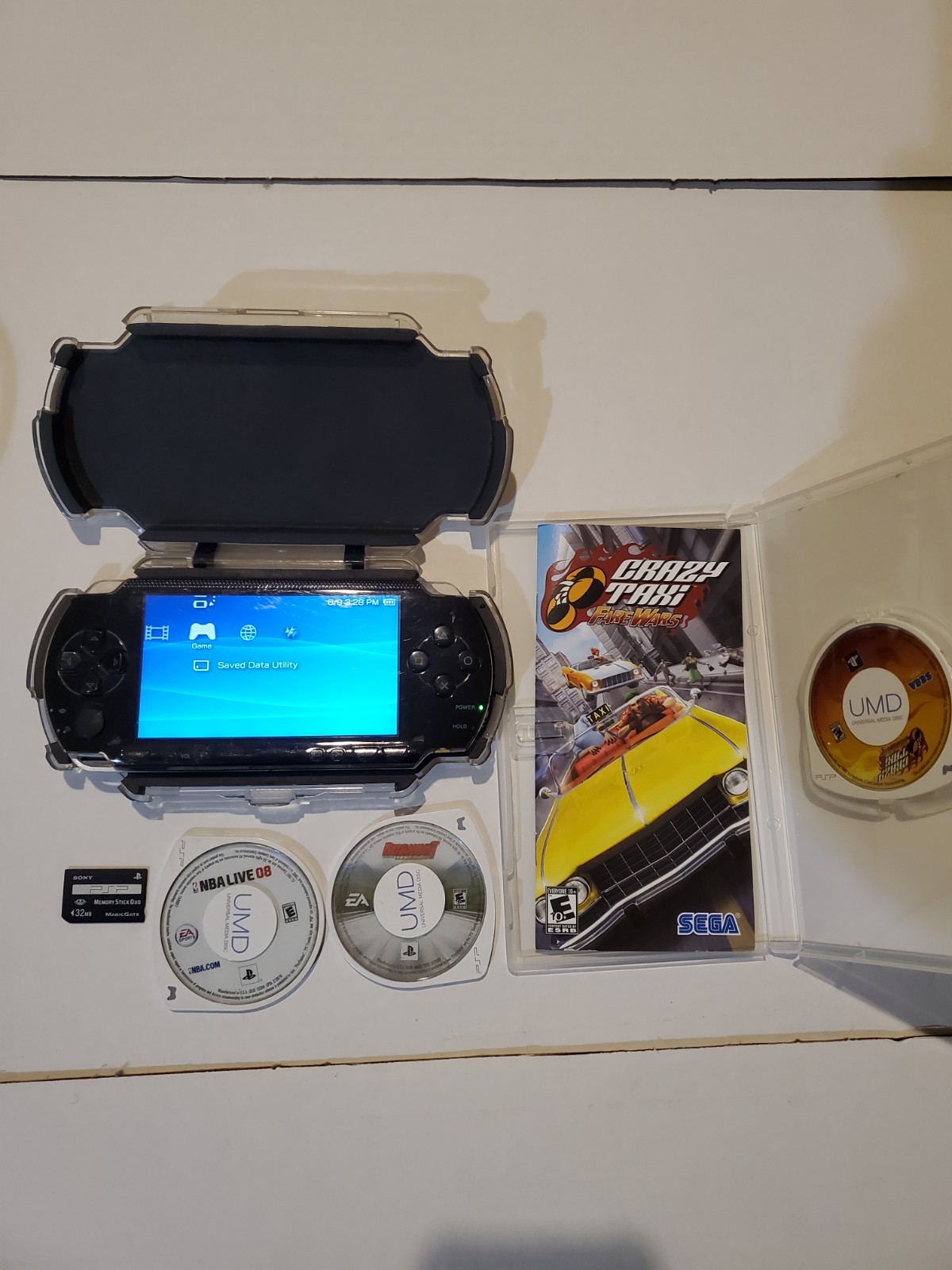 Used psp 1000 with case and 3 games and 32 mb memory card and charger