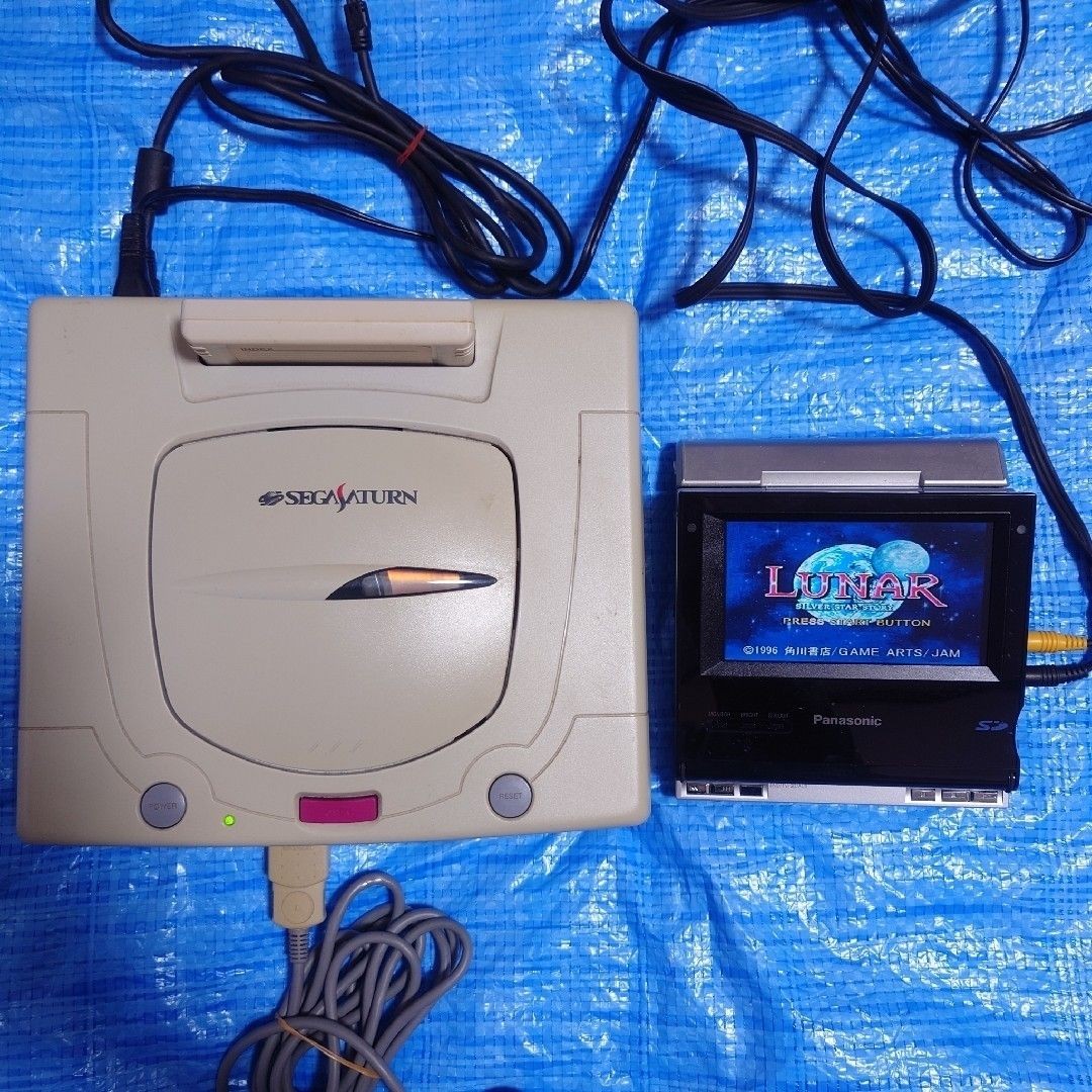 Sega Saturn console + 20 software set.Tested from Japan