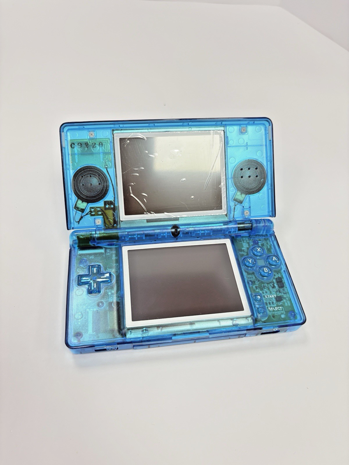 Refurbished Nintendo DS Lite Handheld – Transparent Blue – New Shell