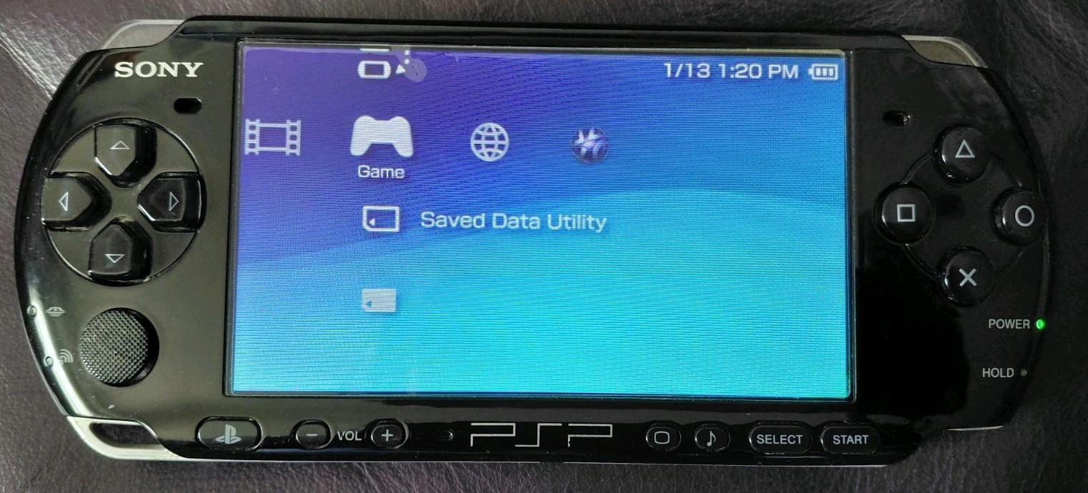 Sony PSP-3000 Piano Black Handheld System With 31 Game & Movie UMDs!Read Descrip