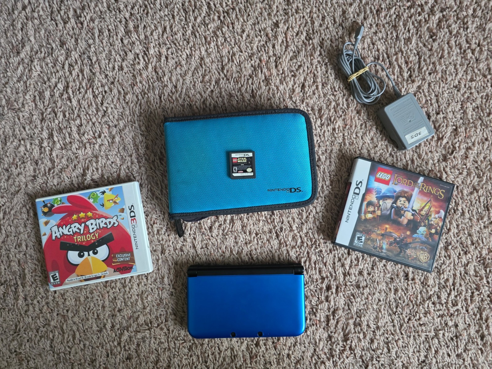 Nintendo 3DS XL Blue/Black w/charger, carrying case and three games
