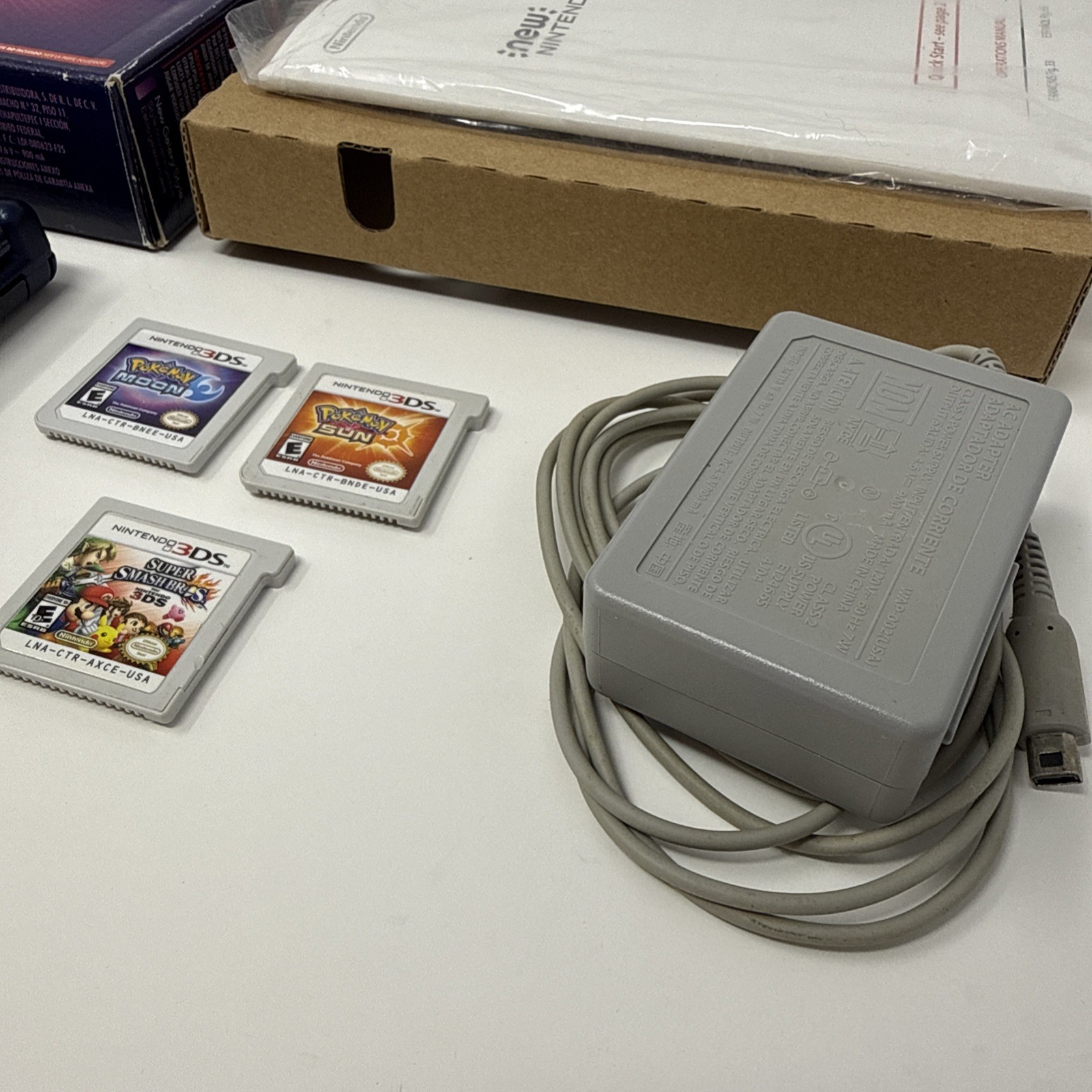 New Nintendo 3DS XL Galaxy Edition Handheld Console CIB + Pokemon & Super Smash