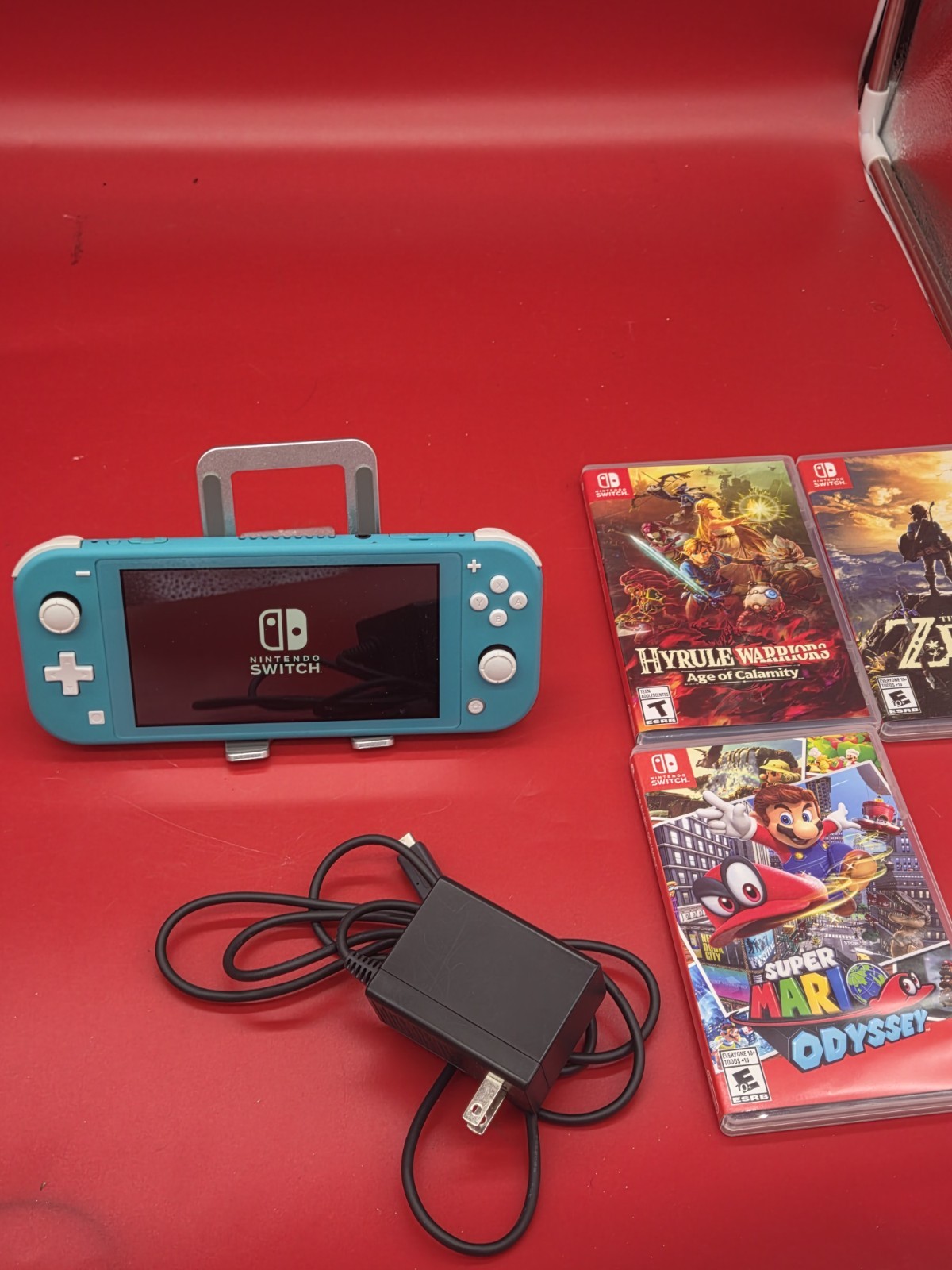 Nintendo Switch Lite Turquoise Bundle Zelda BOTW Mario Odyssey Hyrule Warriors