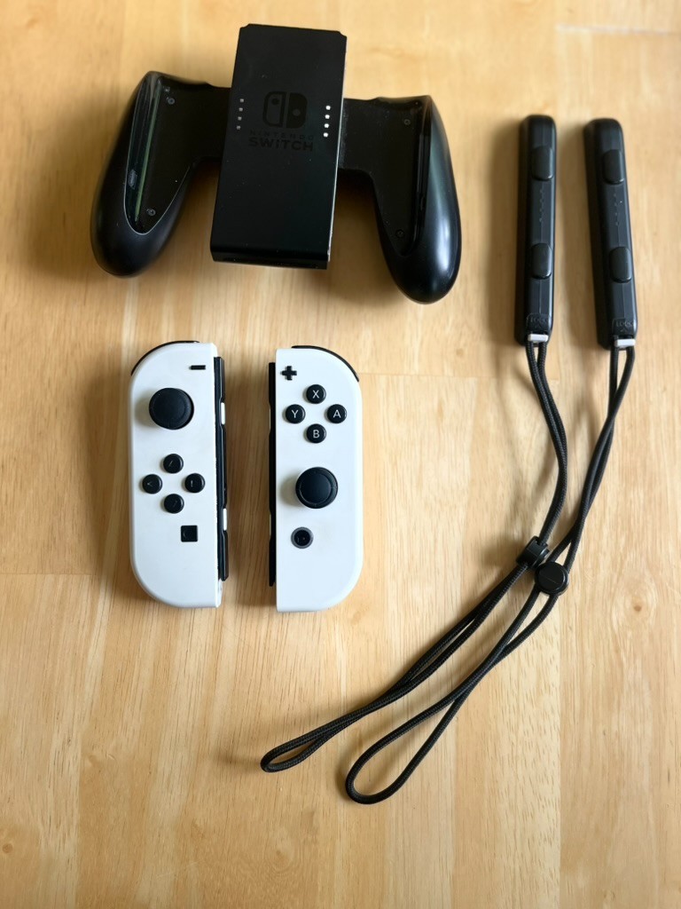 Nintendo Switch Console Bundle – Neon Red/Blue + White Joy‑Cons + Games + Case