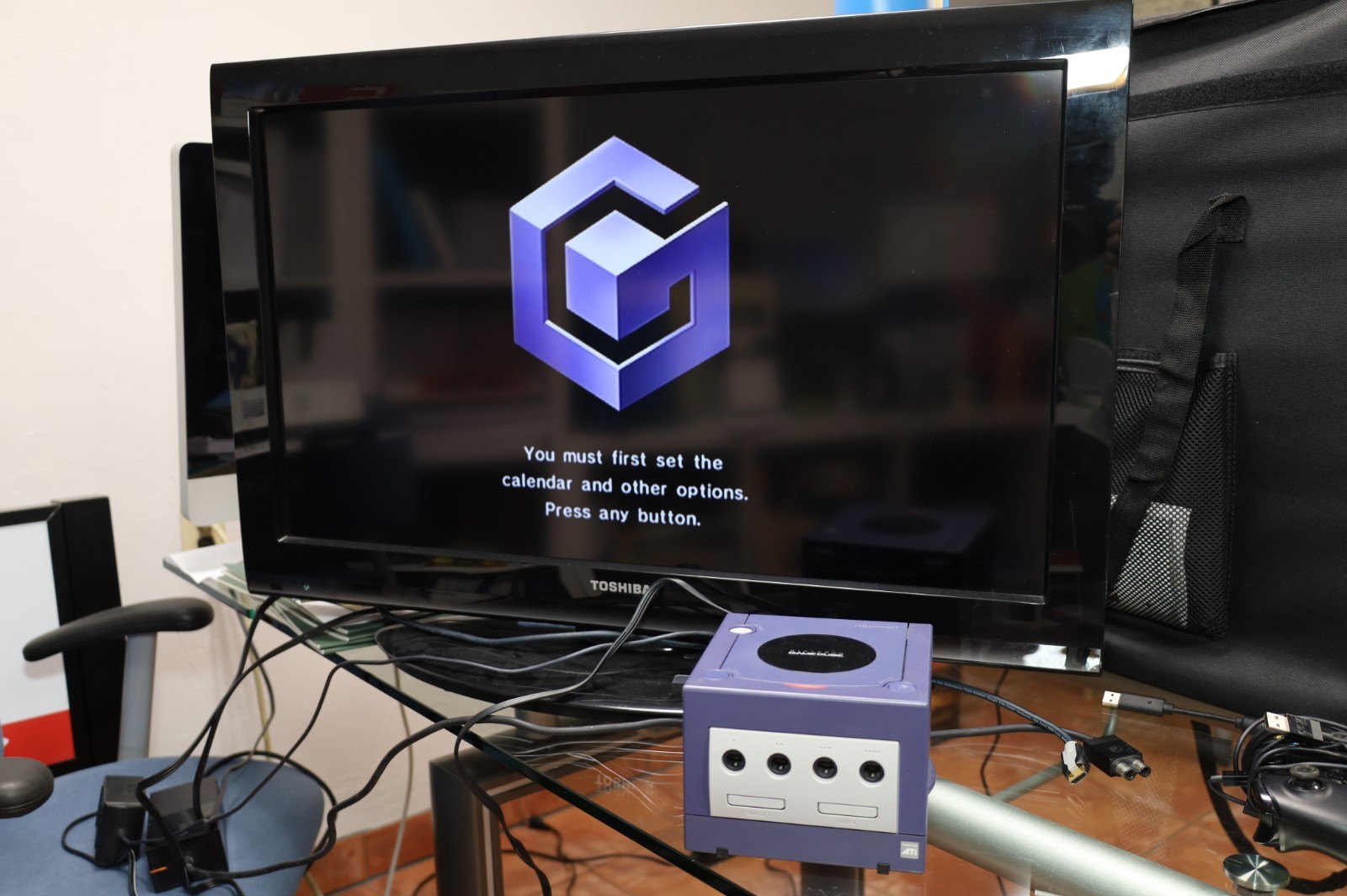 Nintendo GameCube Indigo console with original box, power adapter, and AV cable