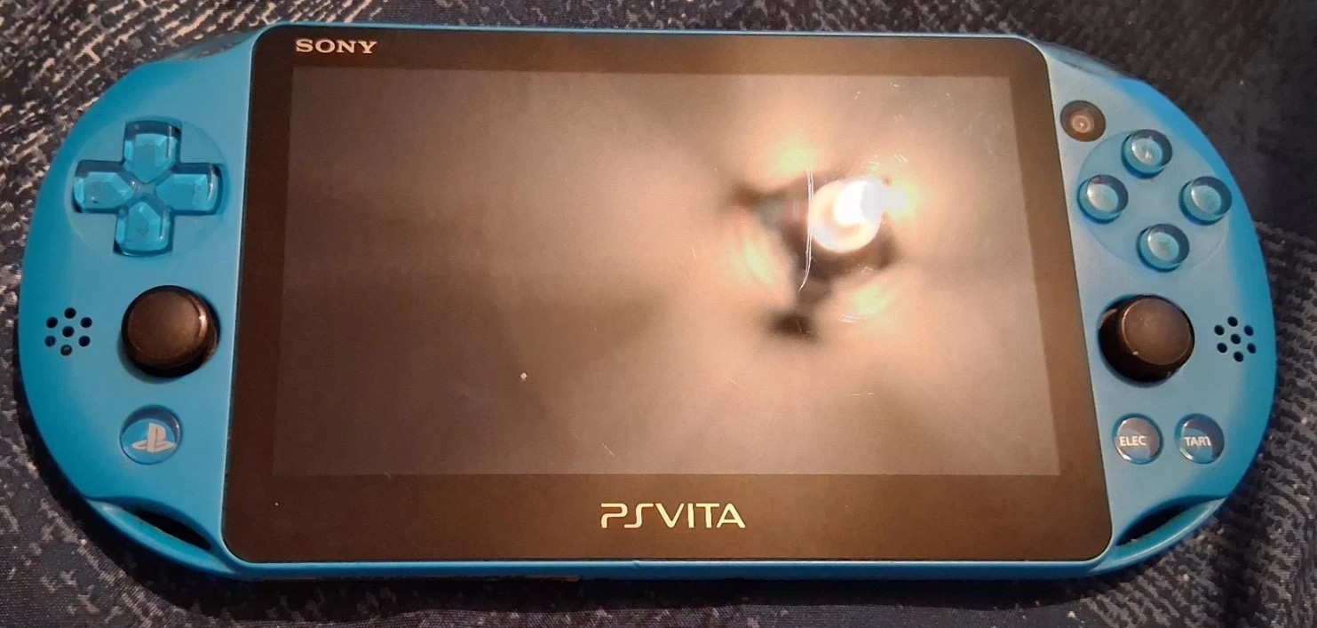 Sony PlayStation Vita Handheld System – AQUA Blue NA VERSION