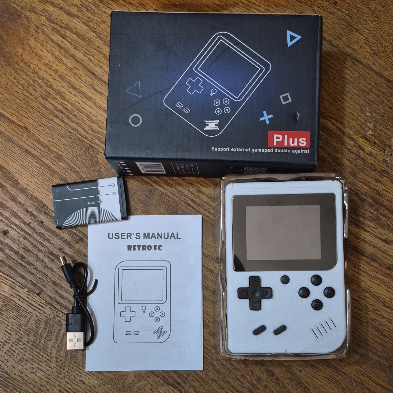 RetroFC RetroFC Plus Handheld System 3.0″ LCD Backlit White USB/AV w Manual