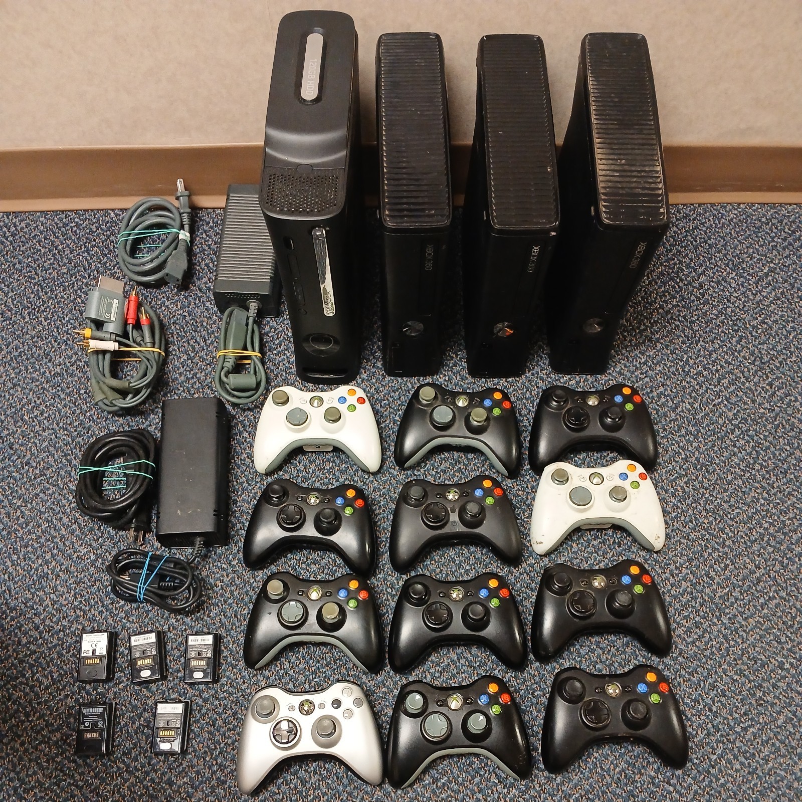 Lot Of 4 Xbox 360, 9 controllers. Most work the other for parts or repair.