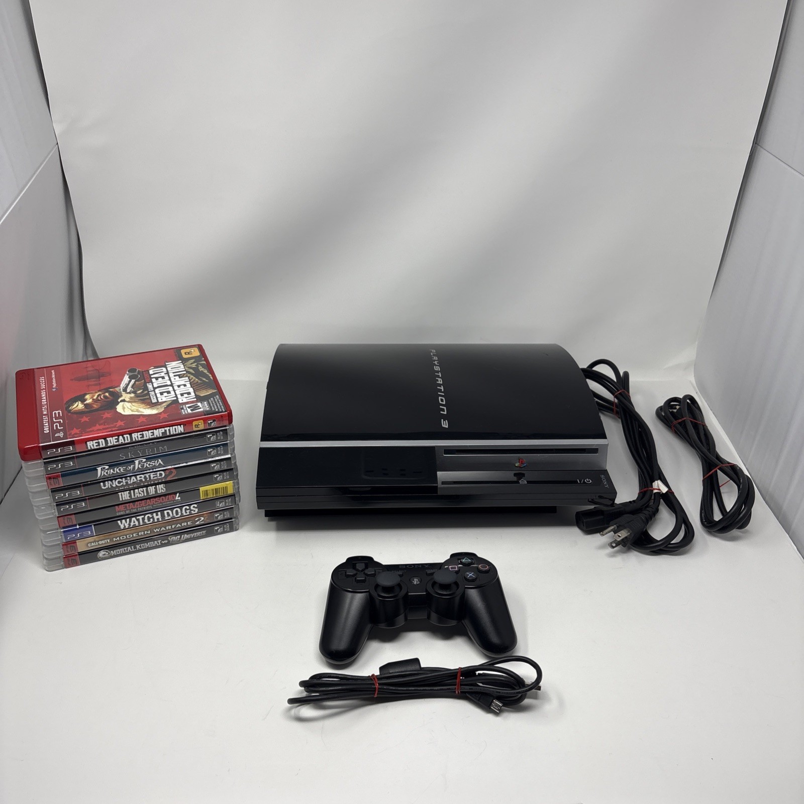 Sony PlayStation 3 PS3 Fat 80GB Console CECHK01 Bundle w/ 9 Great Games – Tested