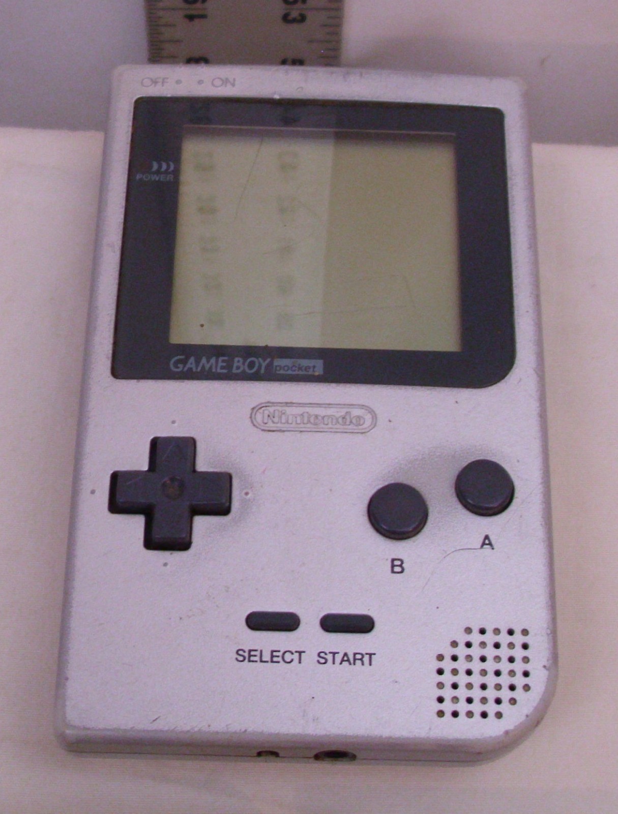 NINTENDO GAME BOY POCKET MODEL NO. MGB-001 WITH FOUR GAMES