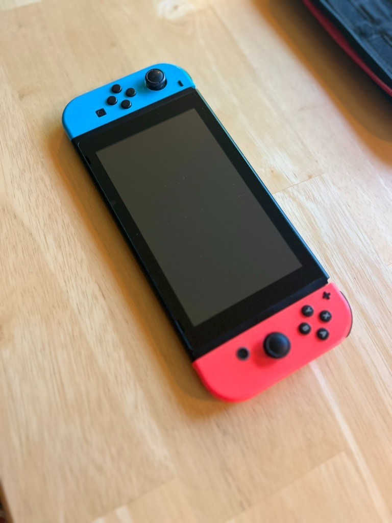 Nintendo Switch Console Bundle – Neon Red/Blue + White Joy‑Cons + Games + Case
