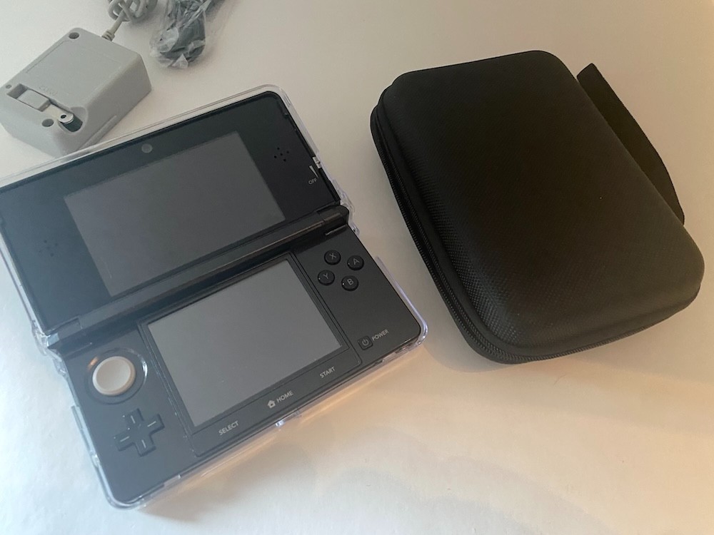 Nintendo 3DS Black Console, 64GB SD Card, Charger, Carry case, Protective Case