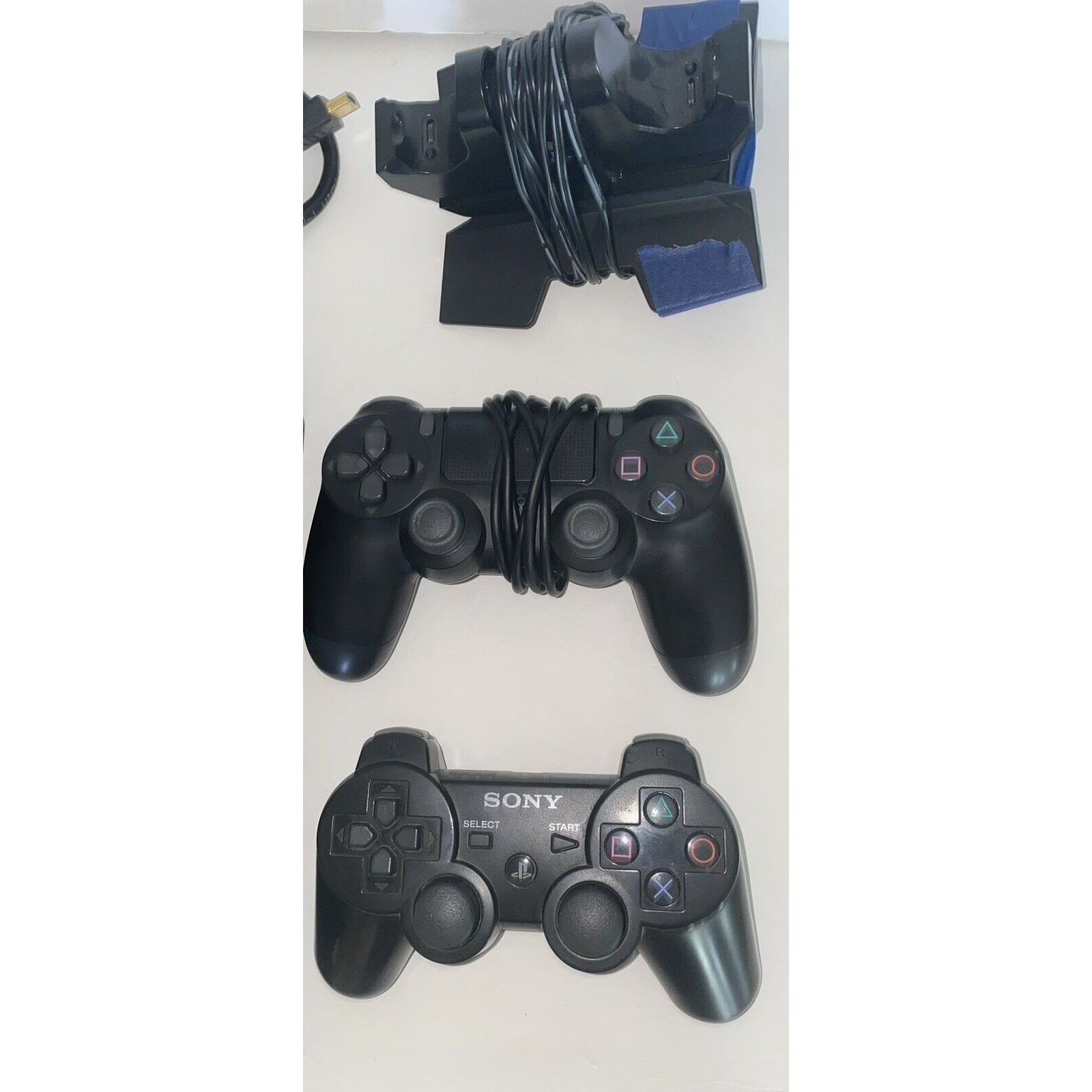 PS4, 2 Wireless Controllers, Power Cords, Charging Station Headphones W/Mic