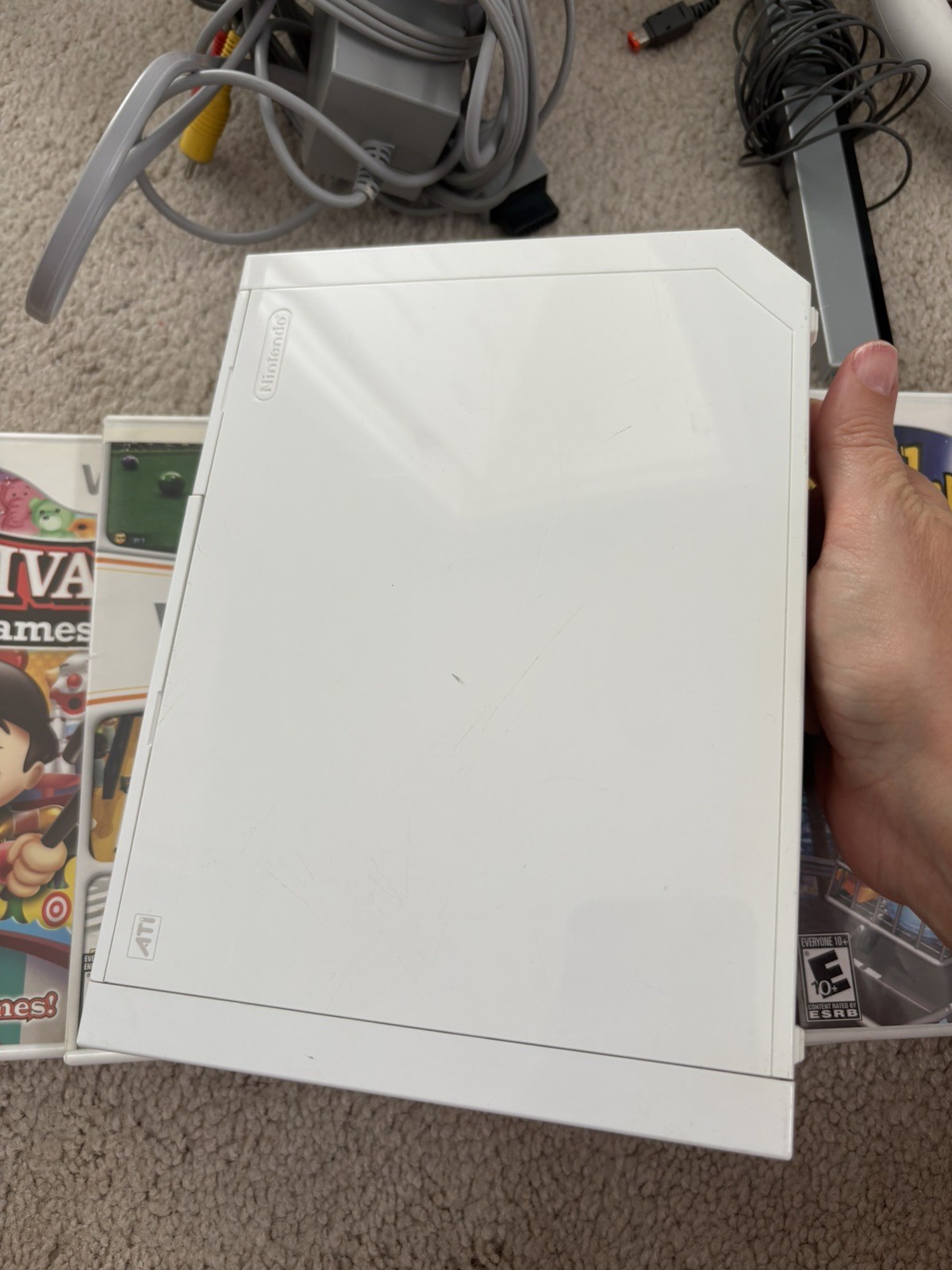 Nintendo Wii Bundle With 6 Games, Console Stand, Plug, Sensor & NO controllers