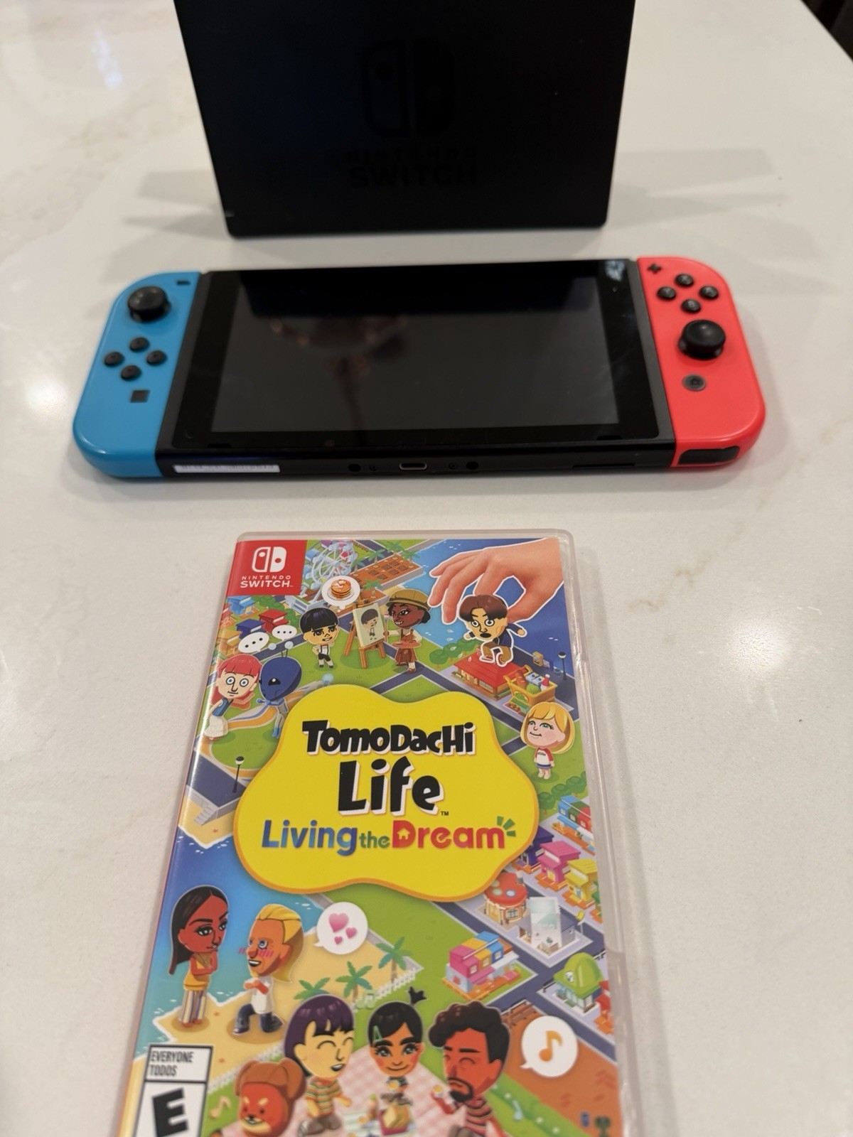 Nintendo Switch 32GB Handheld Console – Neon Red/Neon Blue With Tomodachi Life