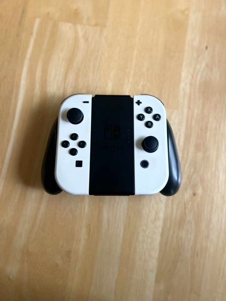 Nintendo Switch Console Bundle – Neon Red/Blue + White Joy‑Cons + Games + Case