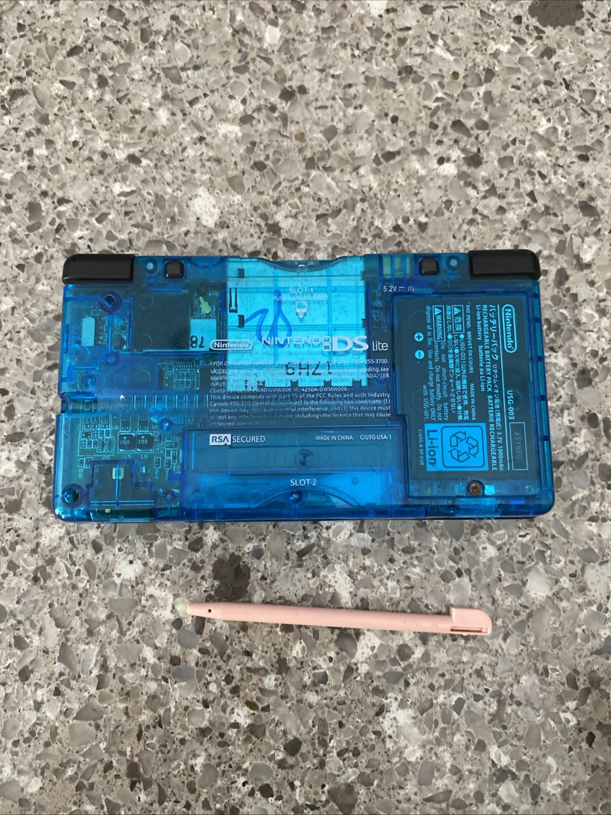 Nintendo DSi Handheld Game Console Clear Blue – No Charger – Pink Stylus