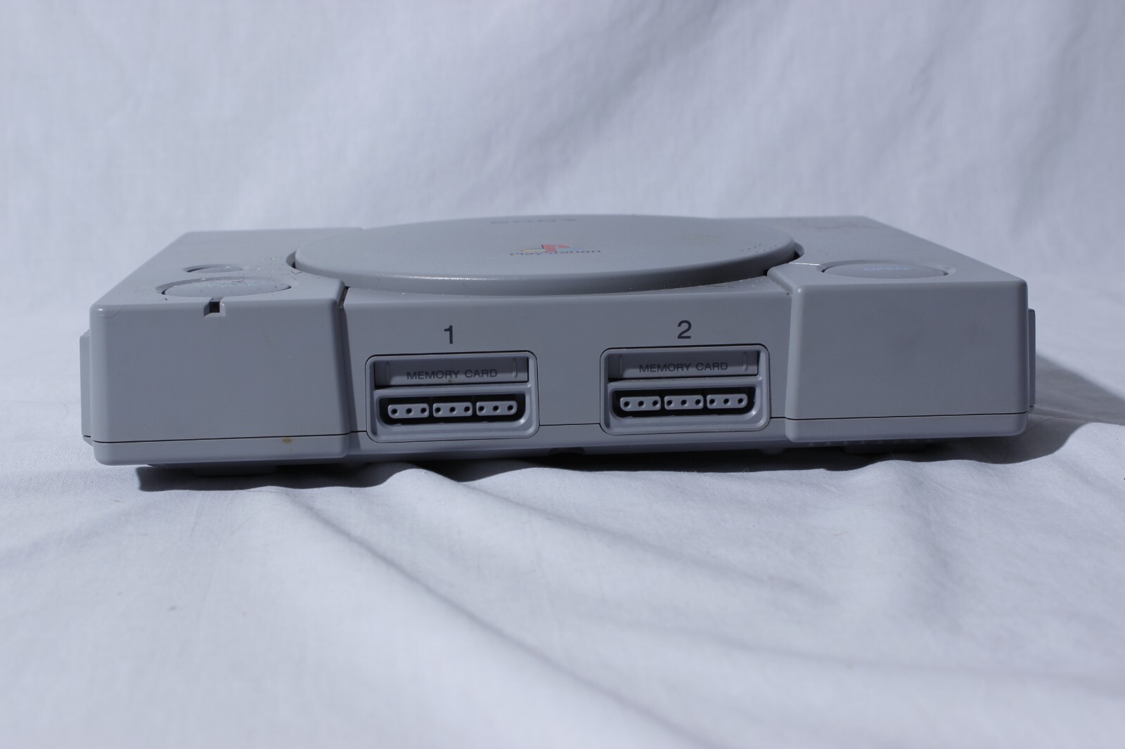 Sony Playstation 1 Gray Console With Blue Sony Controller, A/V Cable, and Power