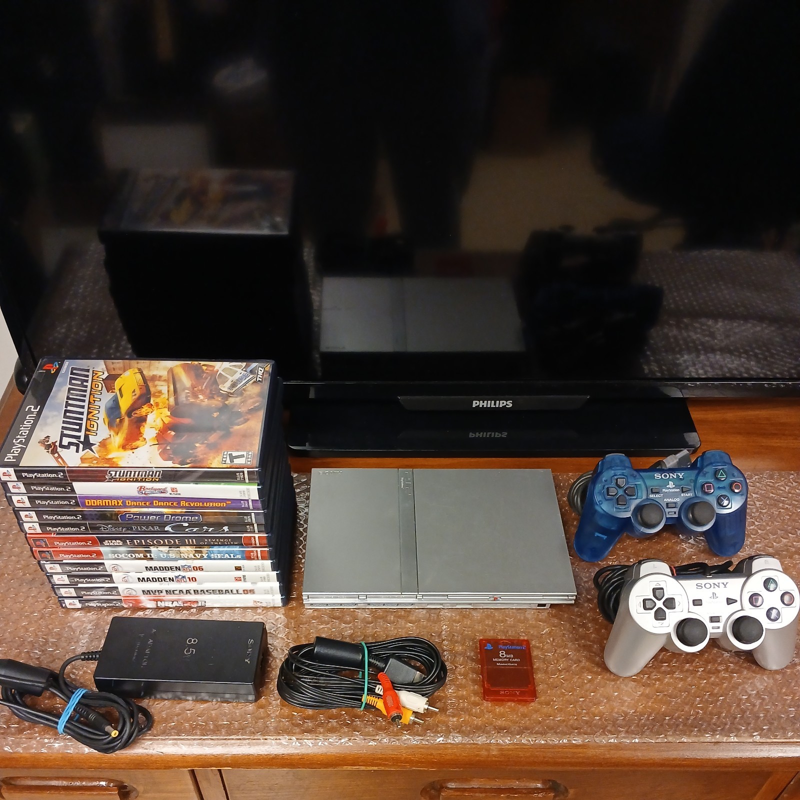 Sony PlayStation 2 Slim Silver SCPH-79001 w/ 2 Controllers, Cables, Memory card.