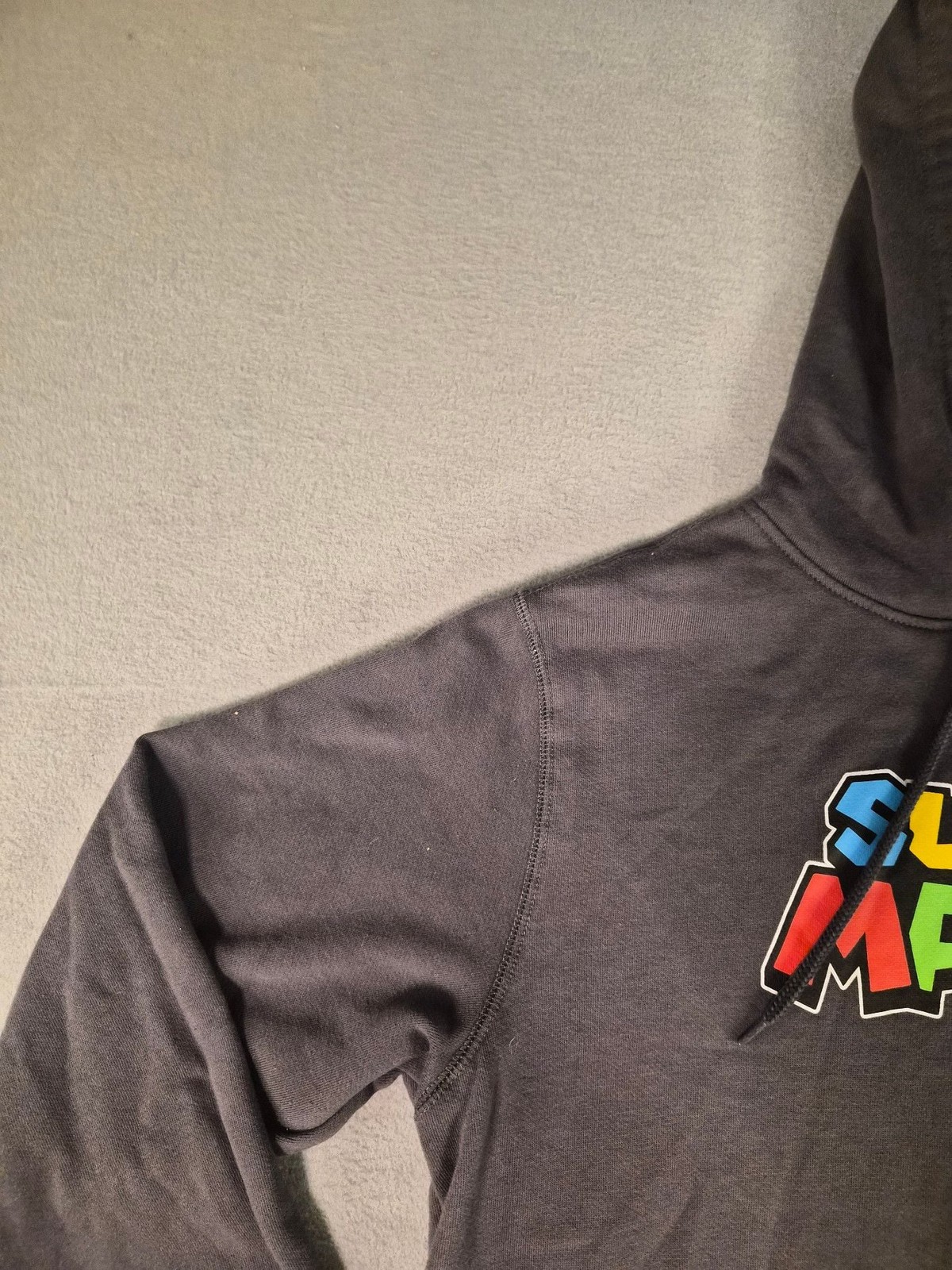 Nintendo Super Mario Logo Graphic Pullover Hoodie with Sleeve Patch