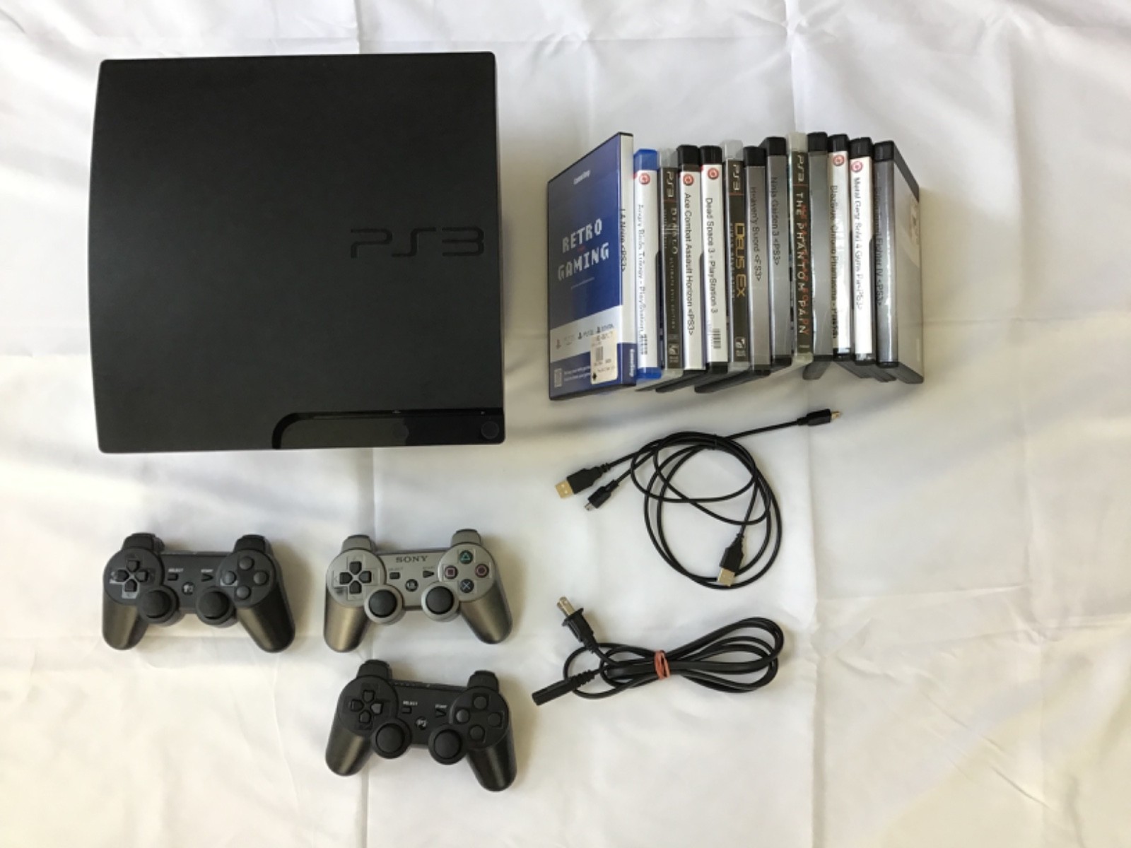 Sony PlayStation 3 Slim Edition 320GB Console with many games