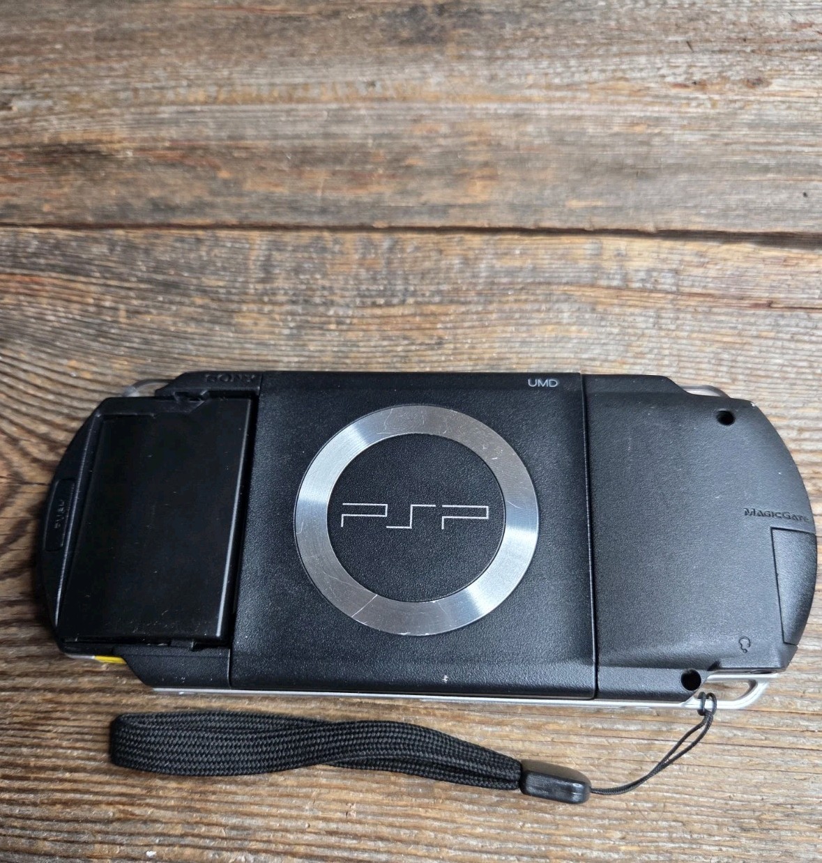 Sony PSP Black System With Charger, 3 Games (Description), And 2 Batteries