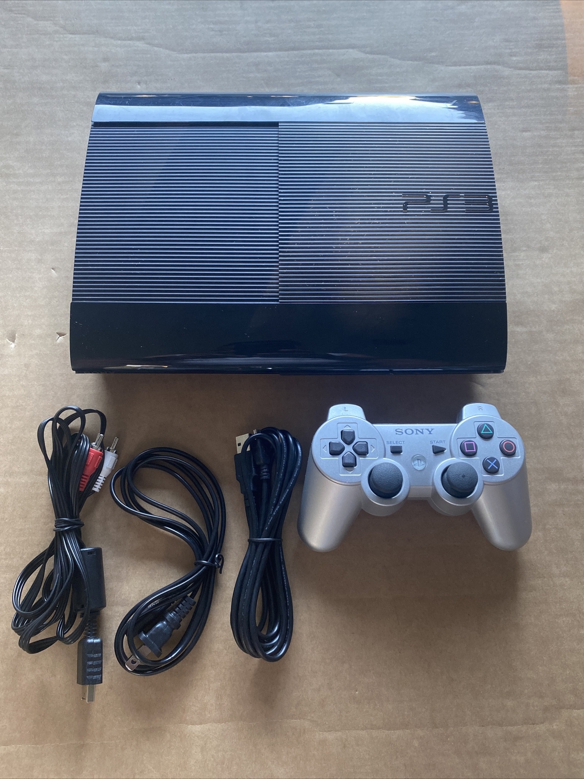 PS3 SUPER SLIM CECH 4201A 12 GB W/SILVER CONTROLLER & CORDS WORKS GREAT!!