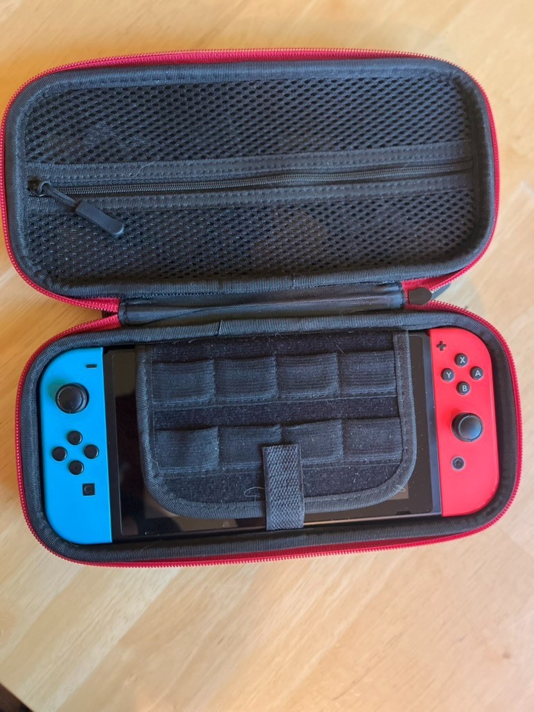 Nintendo Switch Console Bundle – Neon Red/Blue + White Joy‑Cons + Games + Case