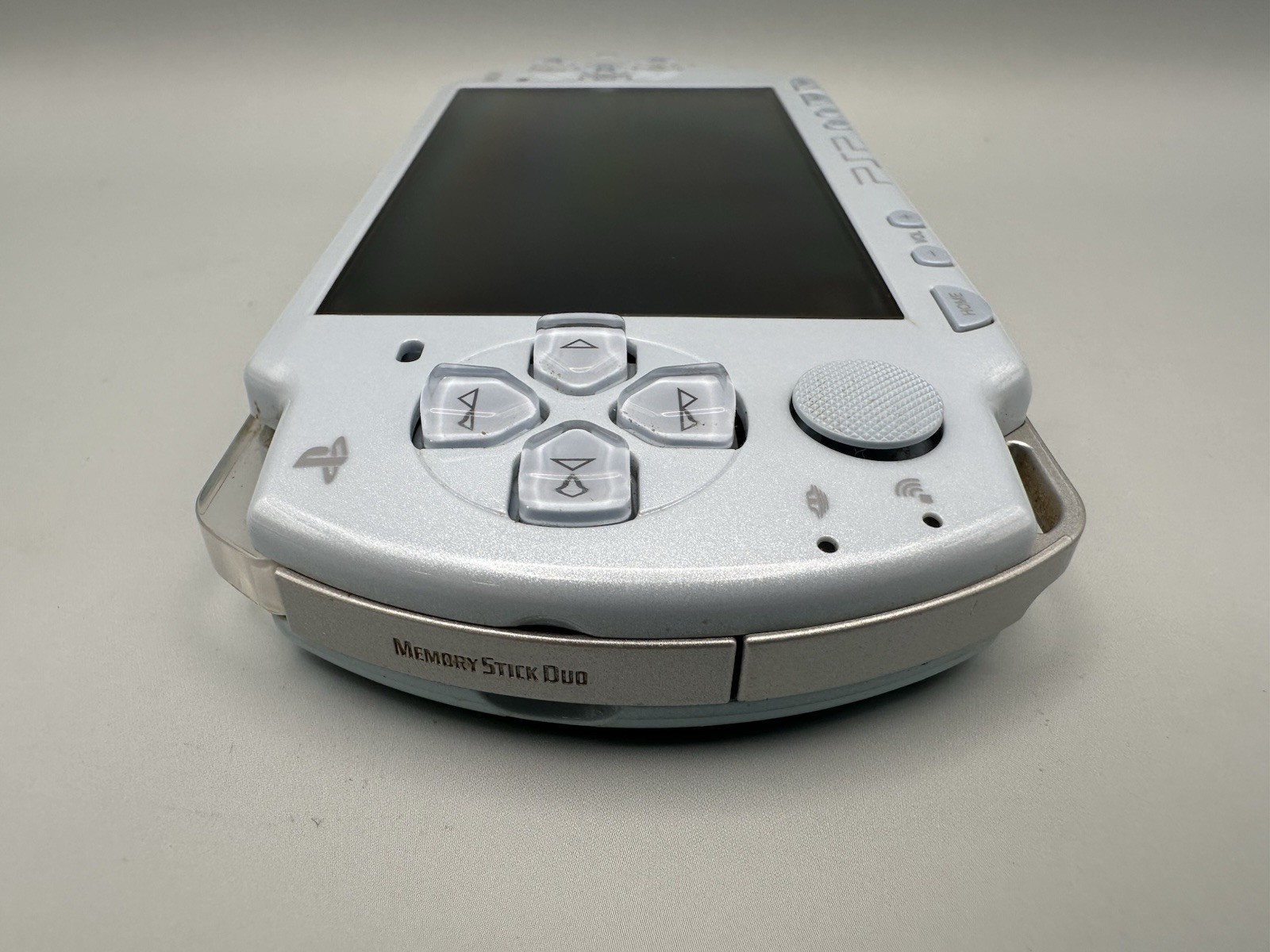 Sony PSP 2000 Console – Felicia Blue + New Battery + 2GB Memory Stick + Charger