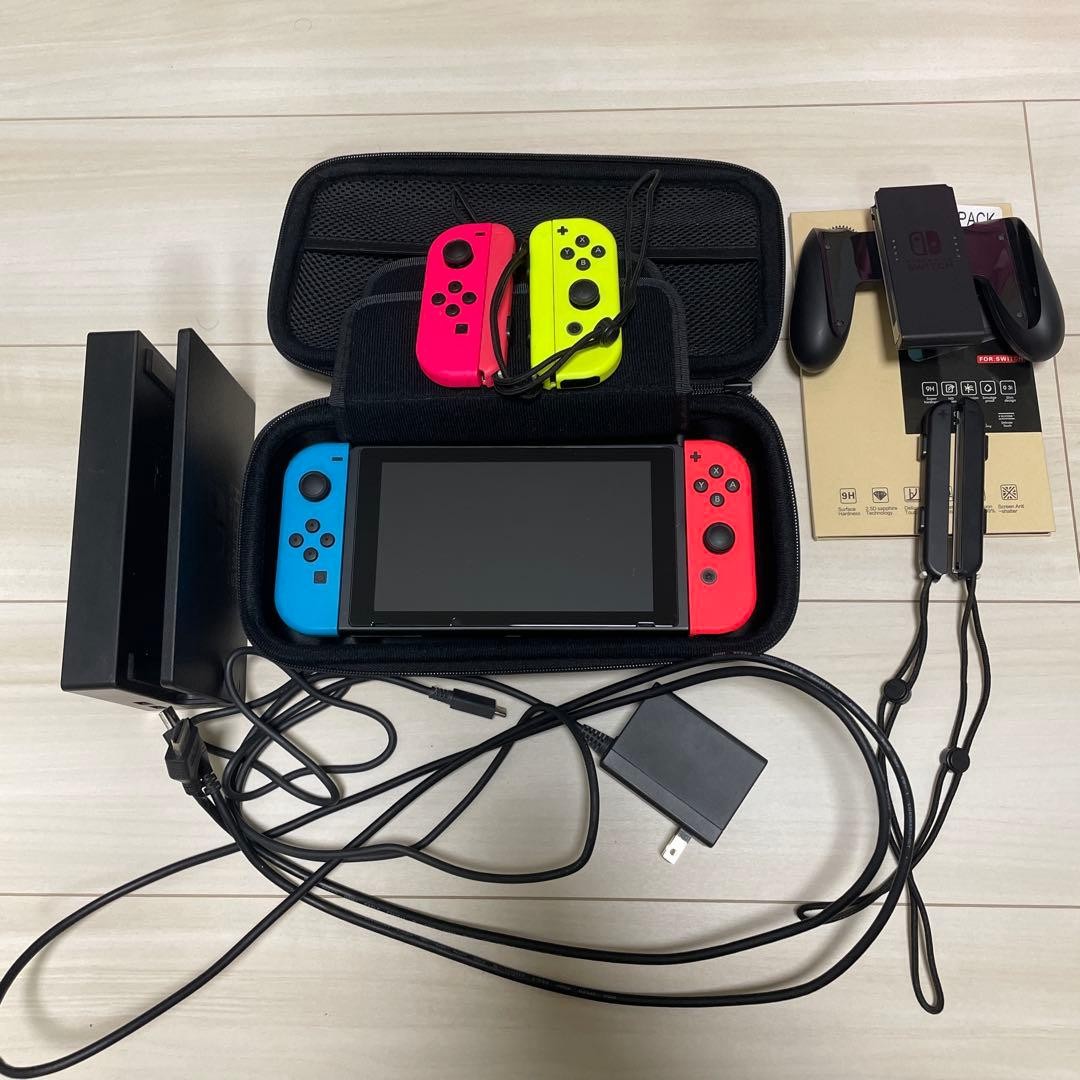 Nintendo Switch console red blue pink yellow with Joy Con
