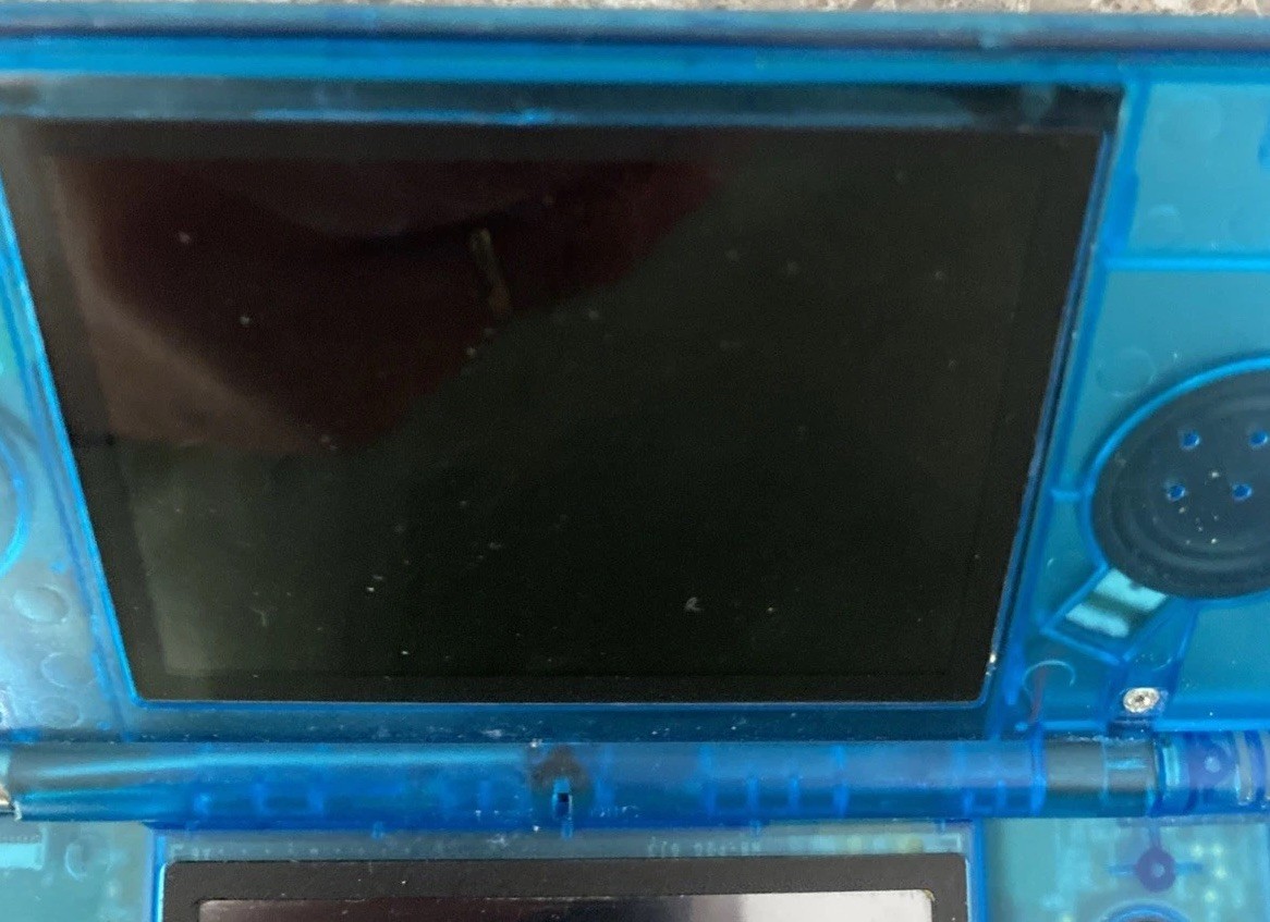 Nintendo DSi Handheld Game Console Clear Blue – No Charger – Pink Stylus