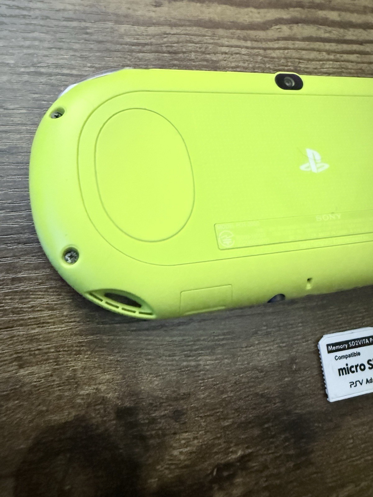 Sony PS Vita 2000 Handheld Console White/Yellow with Wi-Fi micro SD Adapter