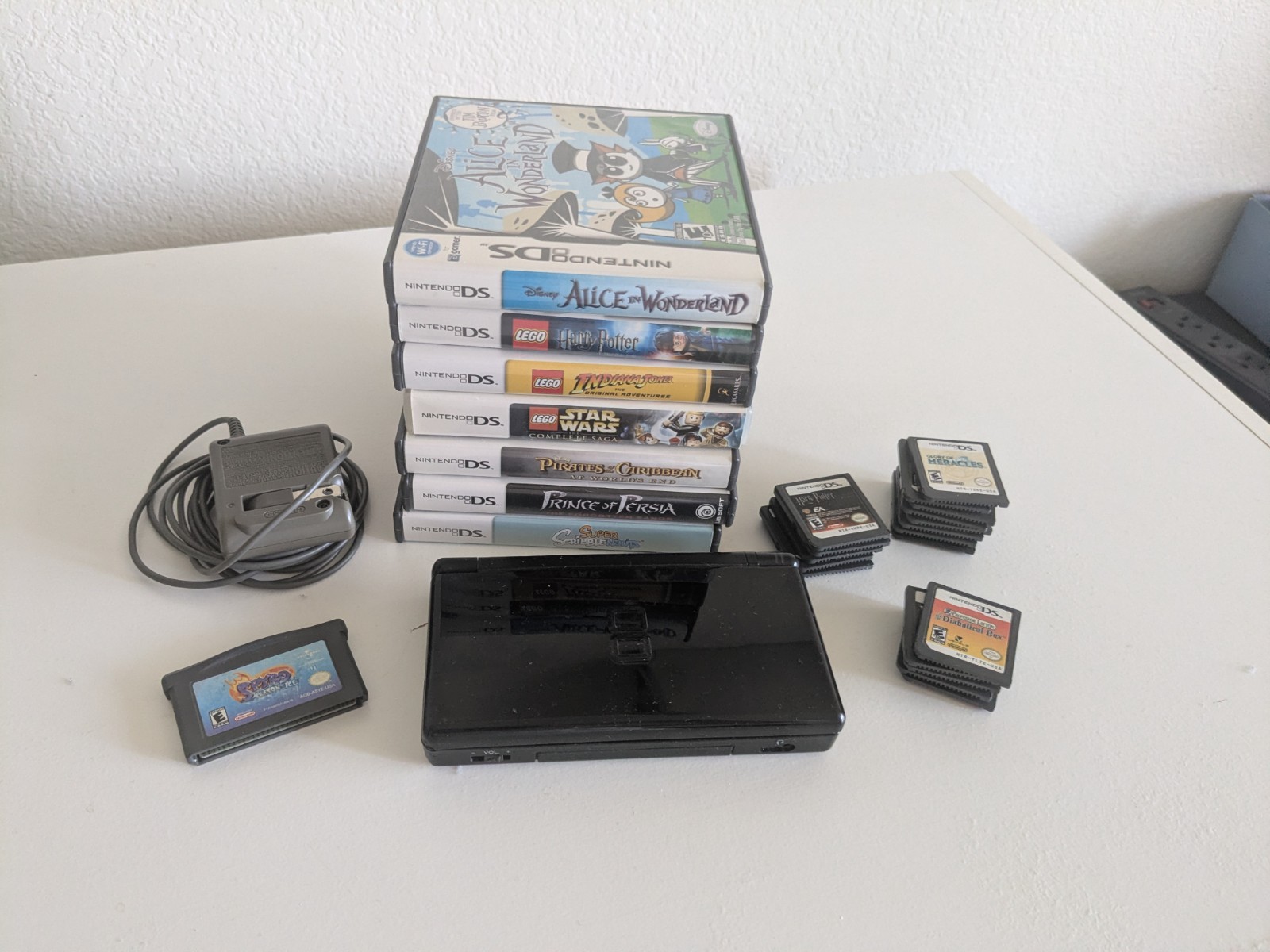 Nintendo DS Lite Black, with Charger (NO stylus) + Lot Of 28 Games – Used, Good