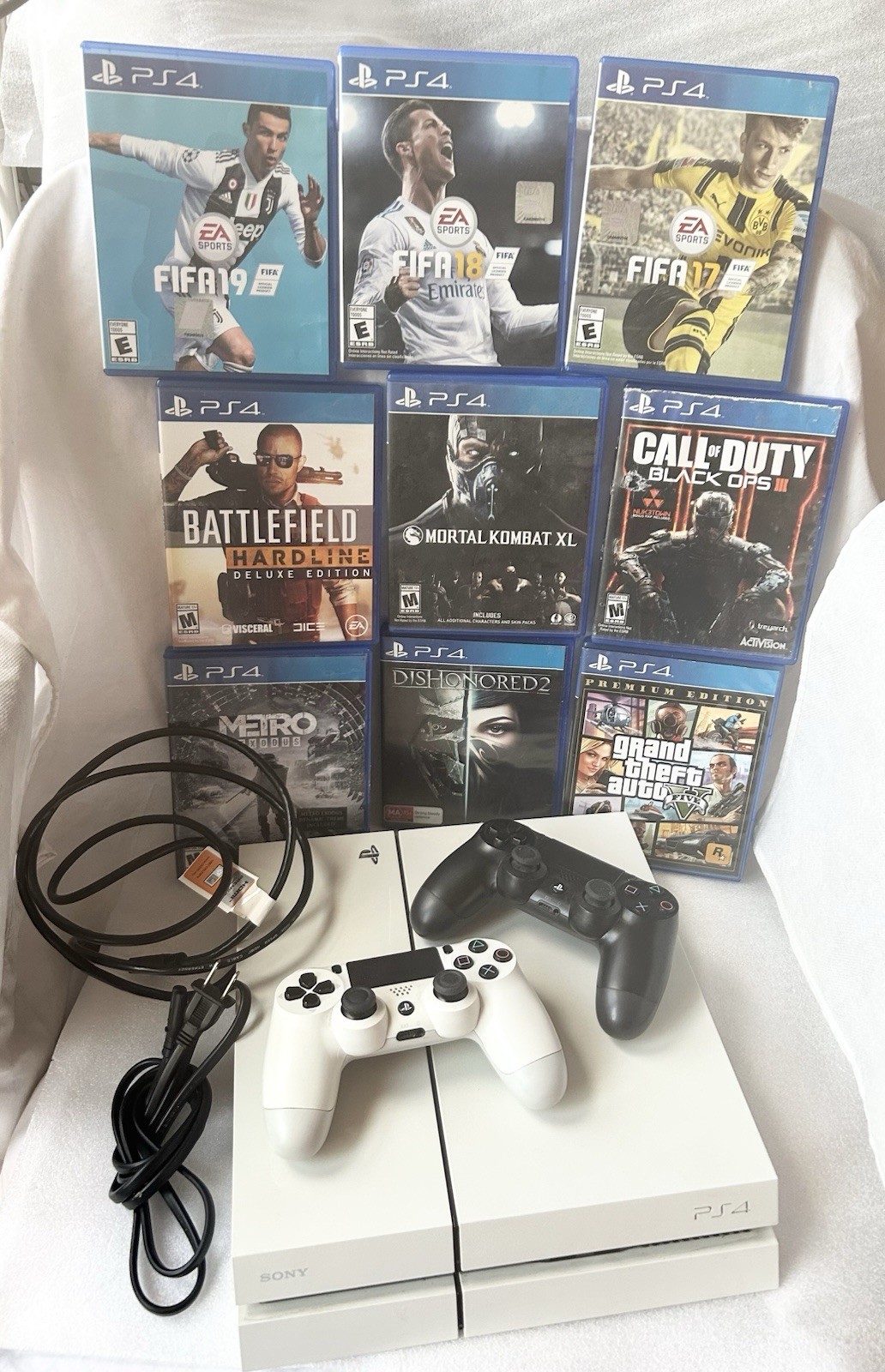 Sony PS4 Console Glacier White 500GB Bundle with 2 Controllers and 9 Games