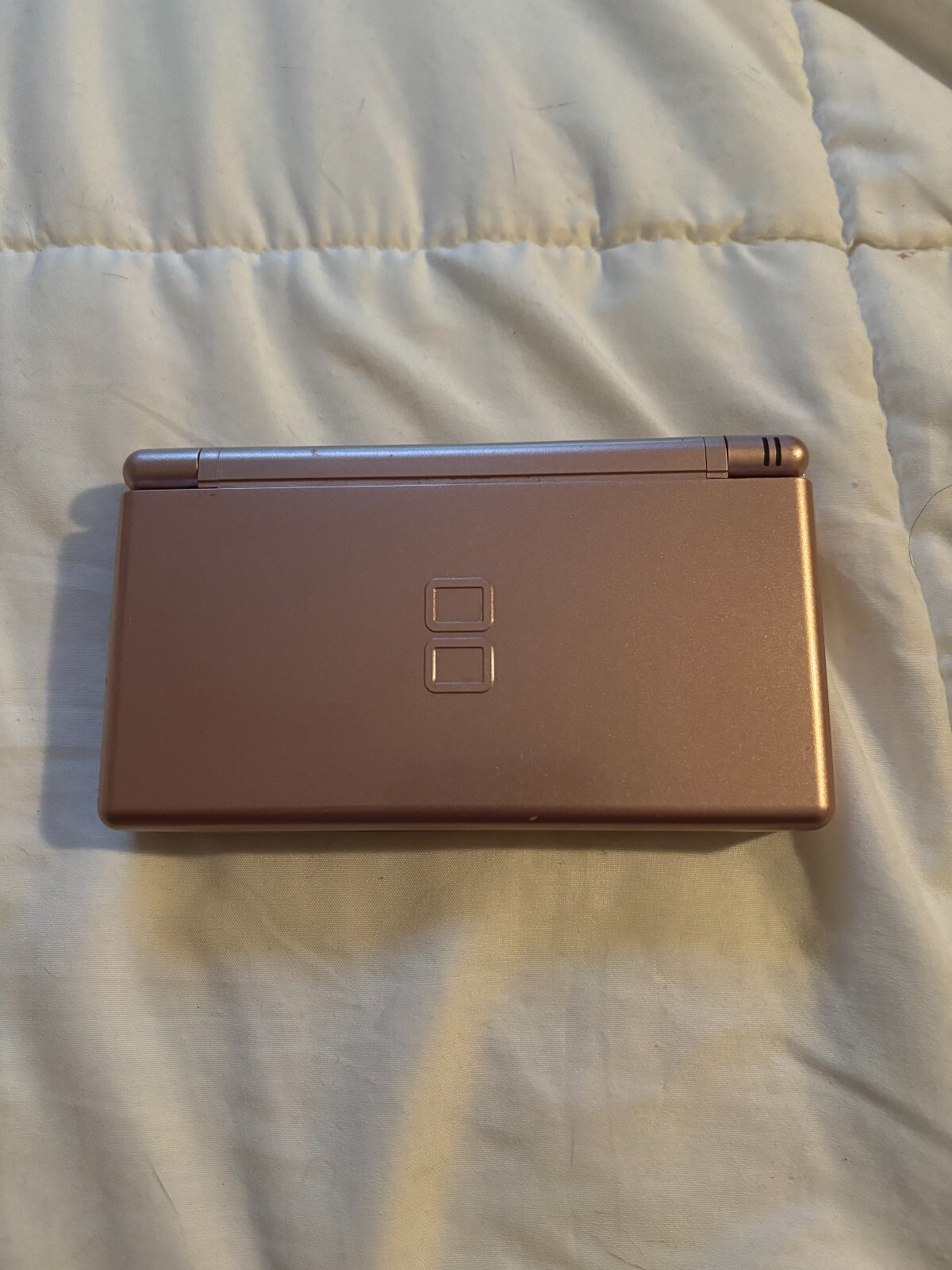 Pink Nintendo DS lite with Charger and Blue carrying case and charger w/ games
