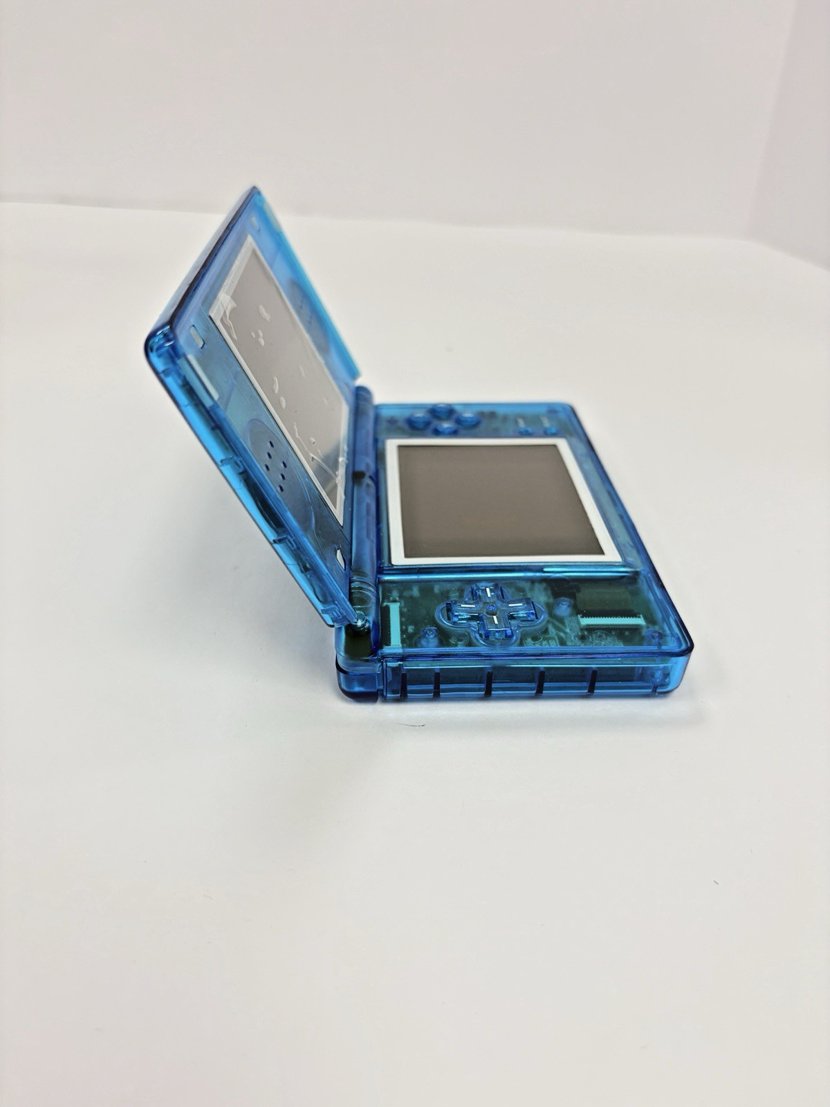 Refurbished Nintendo DS Lite Handheld – Transparent Blue – New Shell