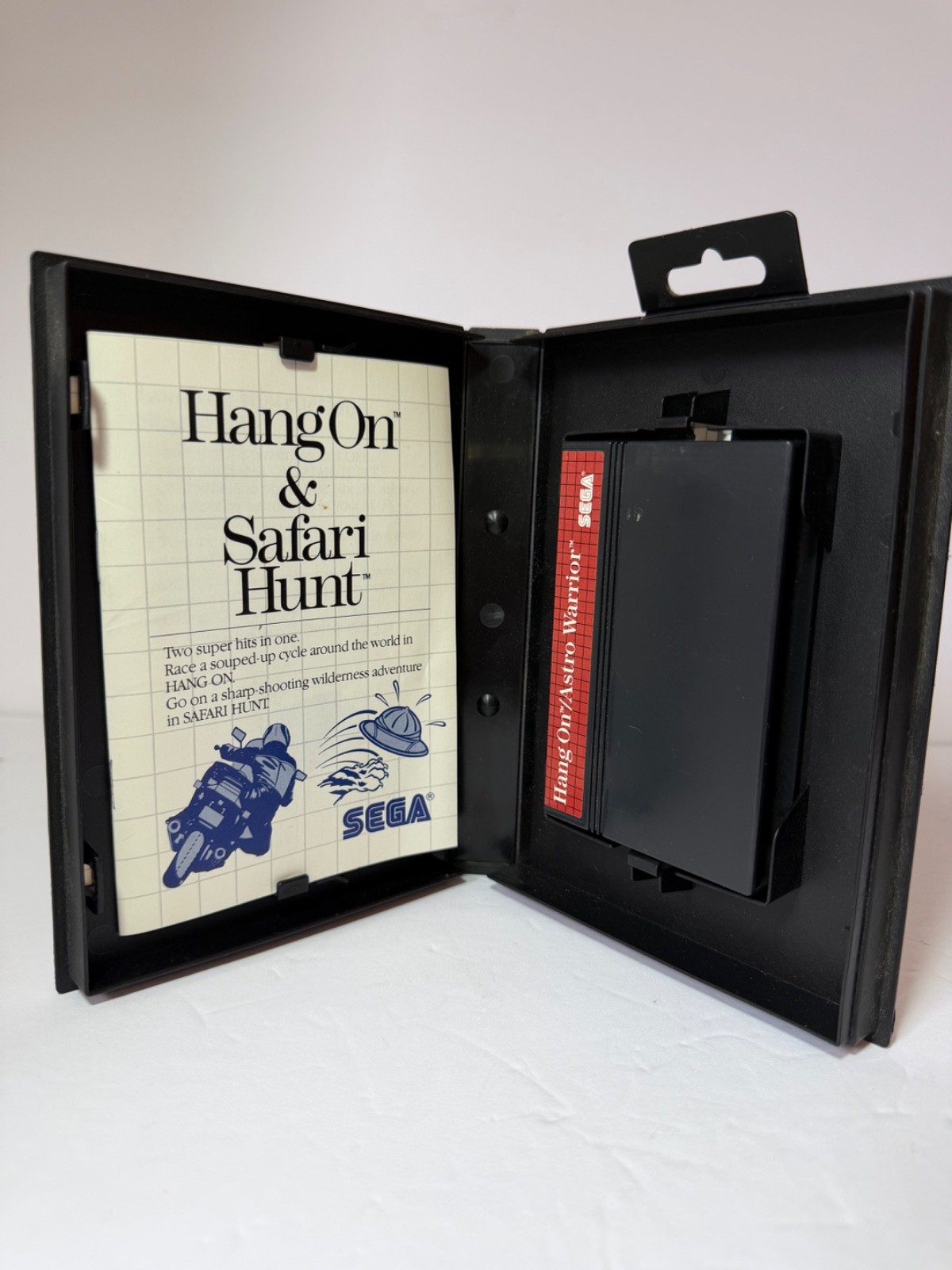 SEGA master system w/two 6 button controllers & phaser 4 games w/ box manual