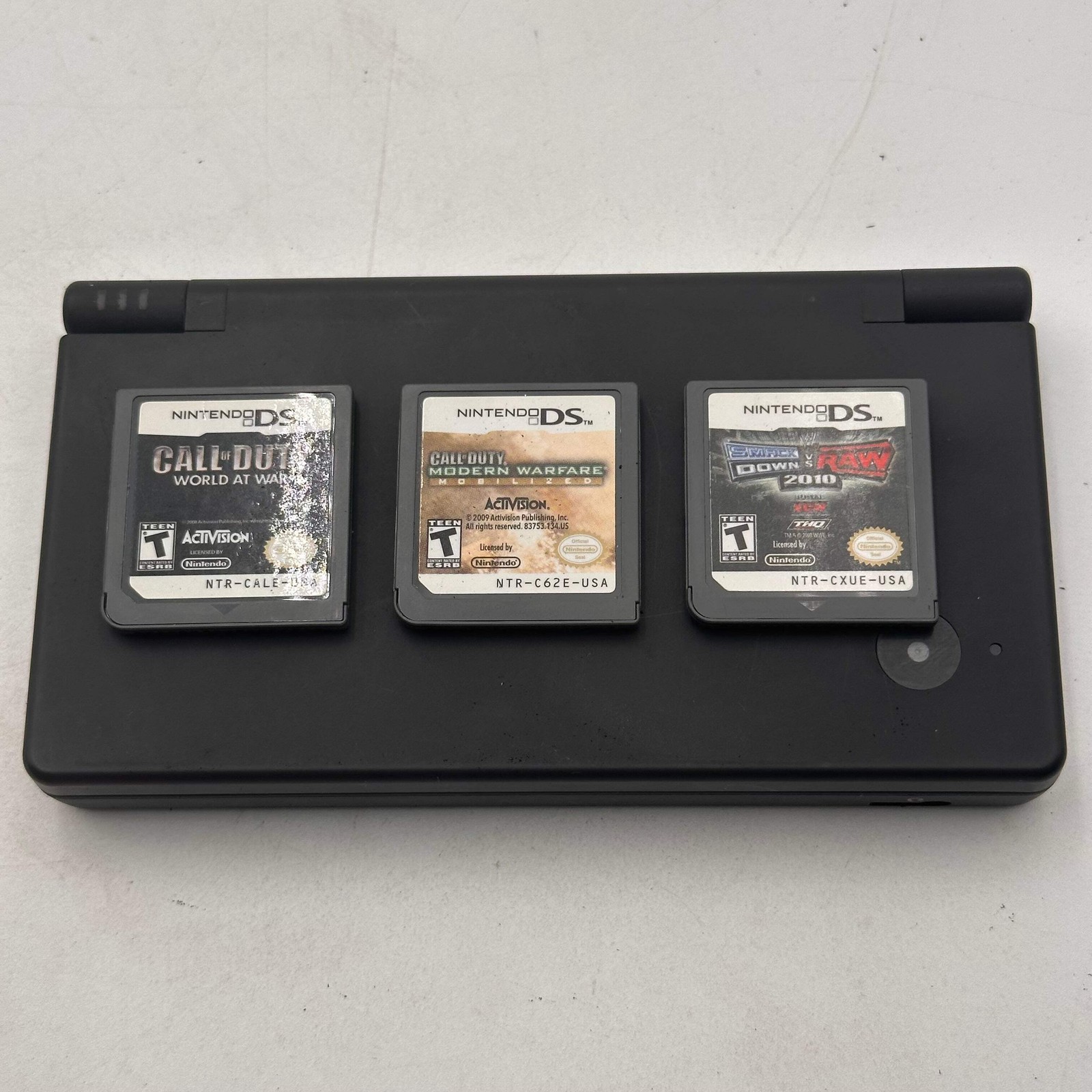 Nintendo DSi (TWL-001) 2008 Black Bundle w/ 3 Games & Carrying Case