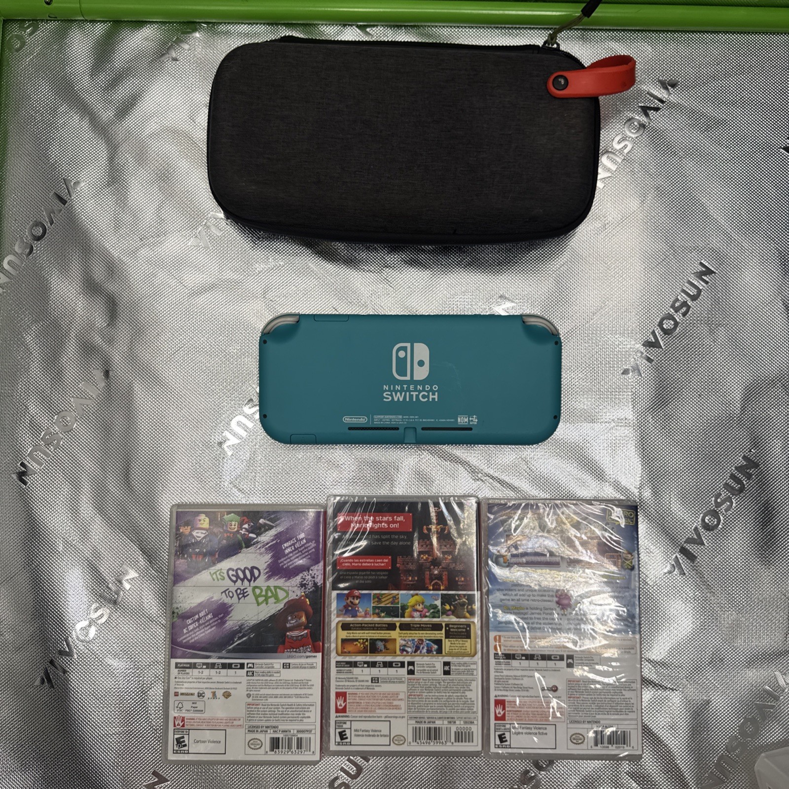 Nintendo Switch Lite 32GB Turquoise Handheld Gaming Console W/3 Games Mario Case