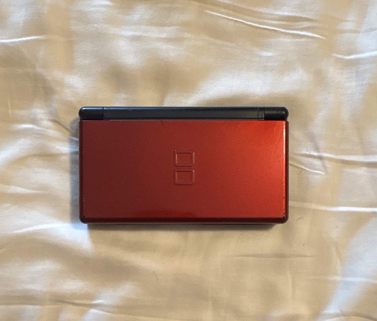 Nintendo DS Lite Handheld System Red/Black Backlit NTSC-U/C USG-001