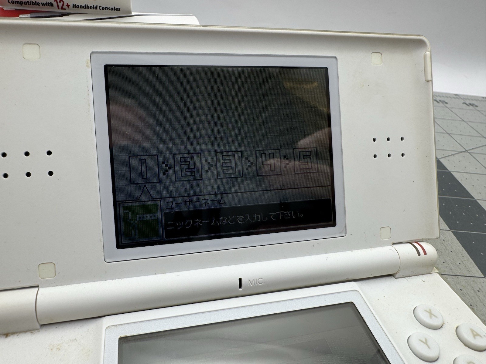 Nintendo DS Lite Console White Japanese With Universal Charger & 3 Games